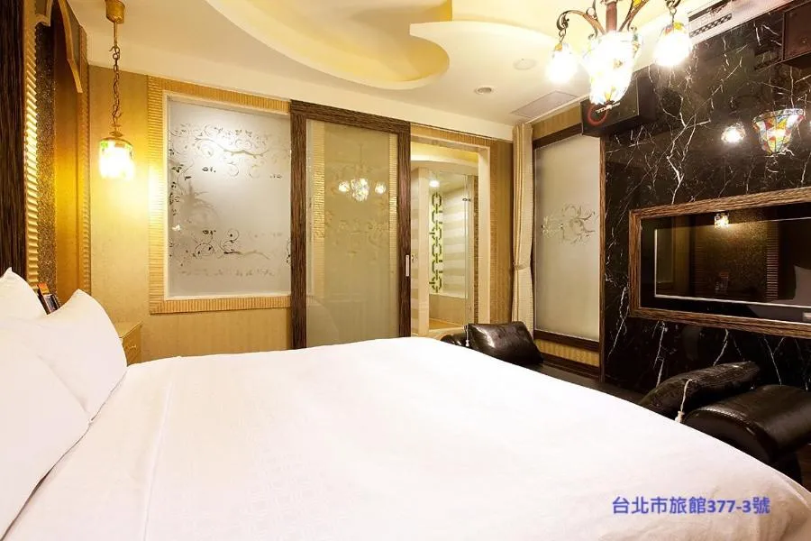 Bed in 探索汽車旅館 延平館 台北市旅館377-3號