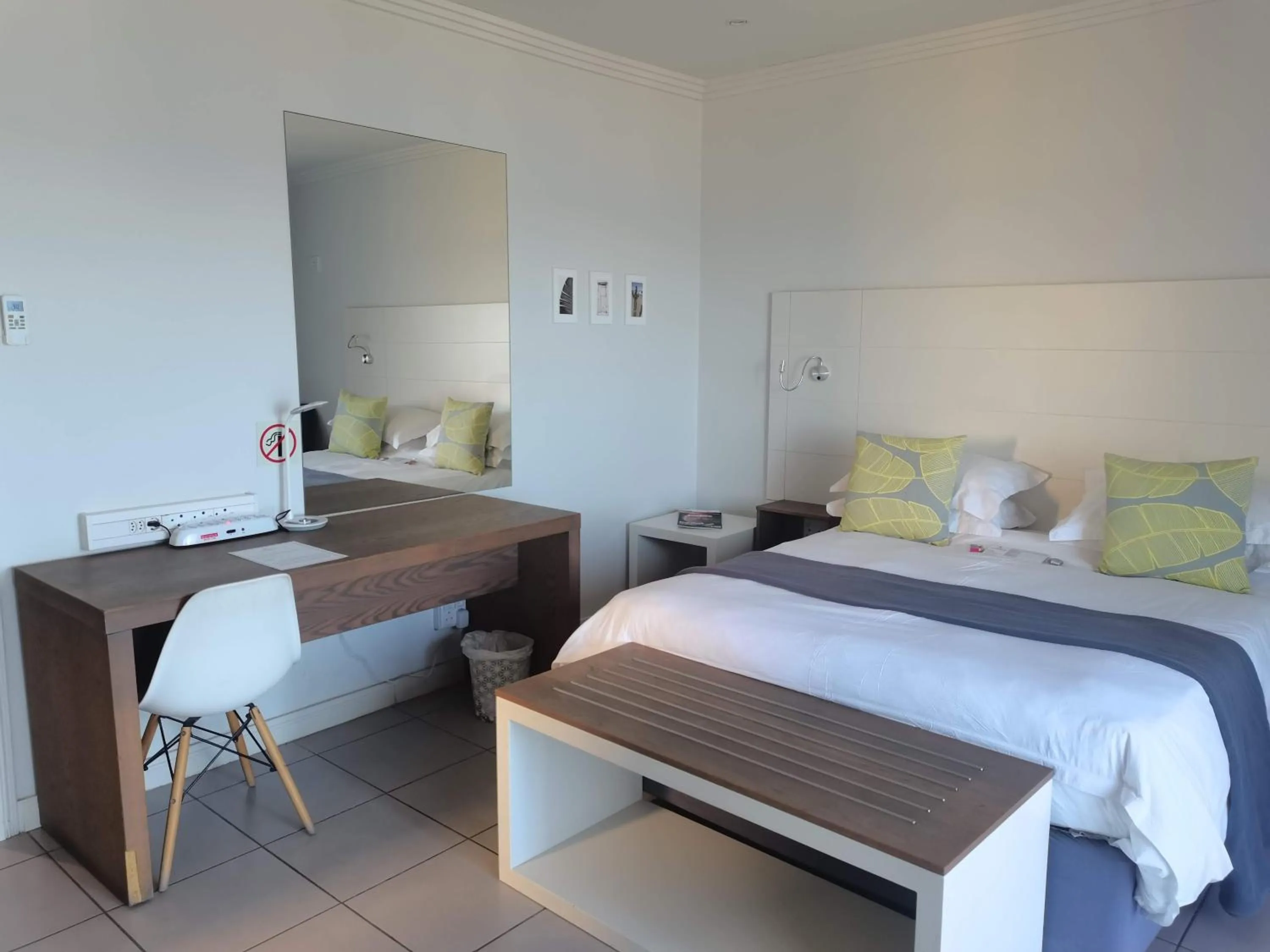 Bed in The Paralian Exclusive Guest House