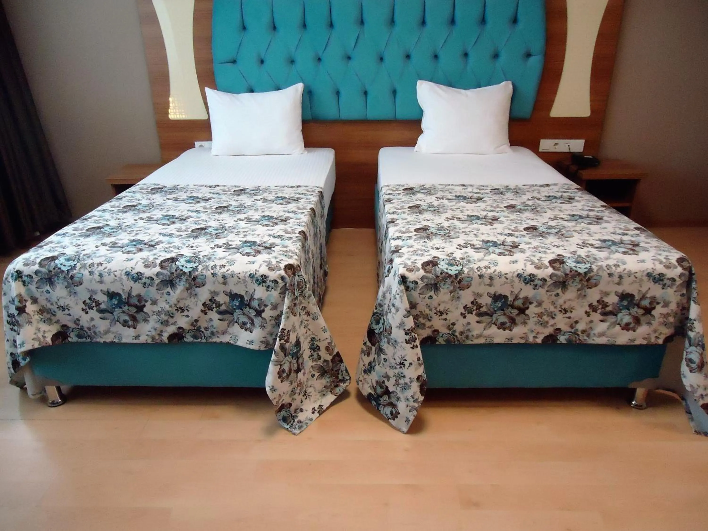 Bed in Golden Lounge Hotel