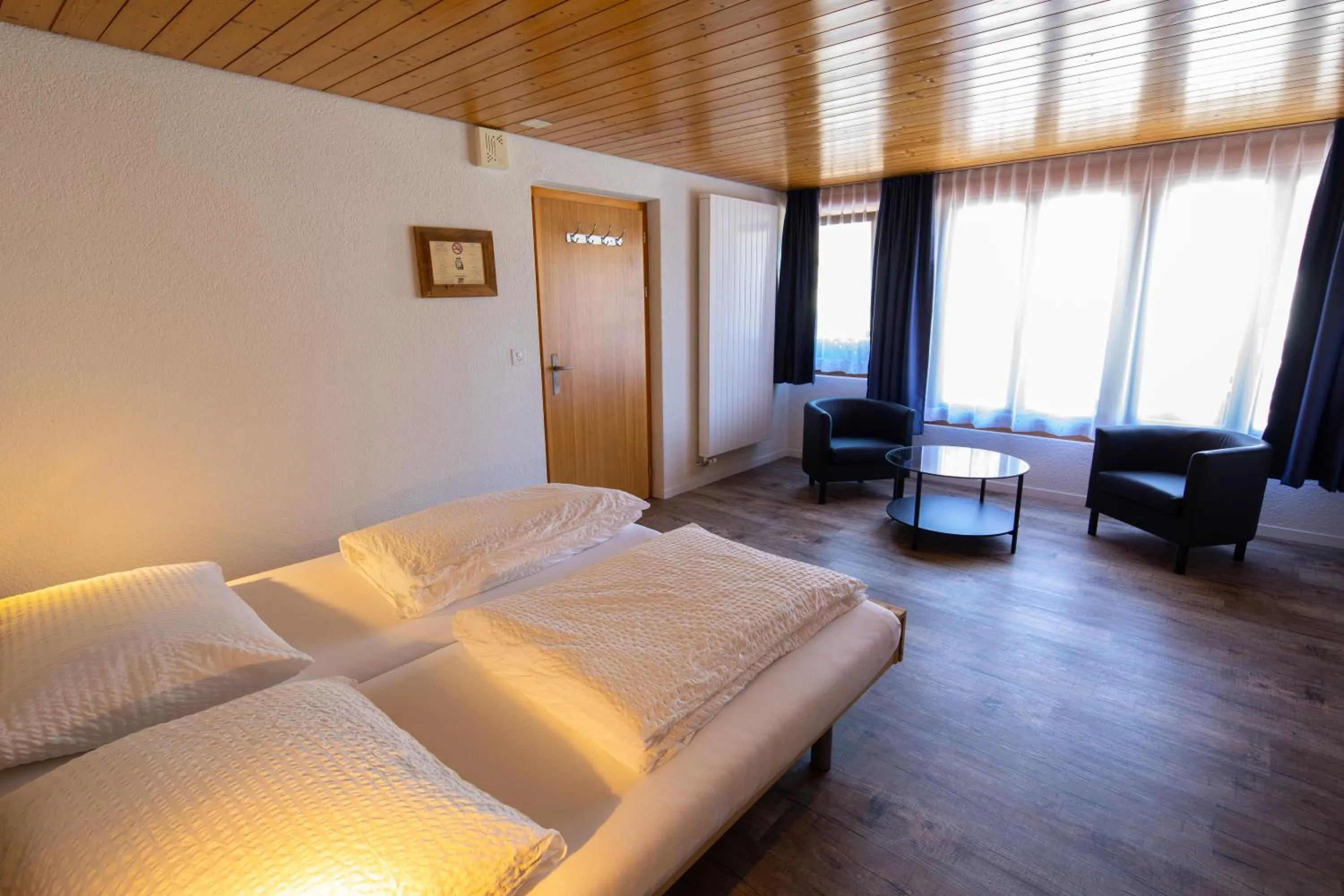 Photo of the whole room, Bed in Hotel Restaurant Simplon