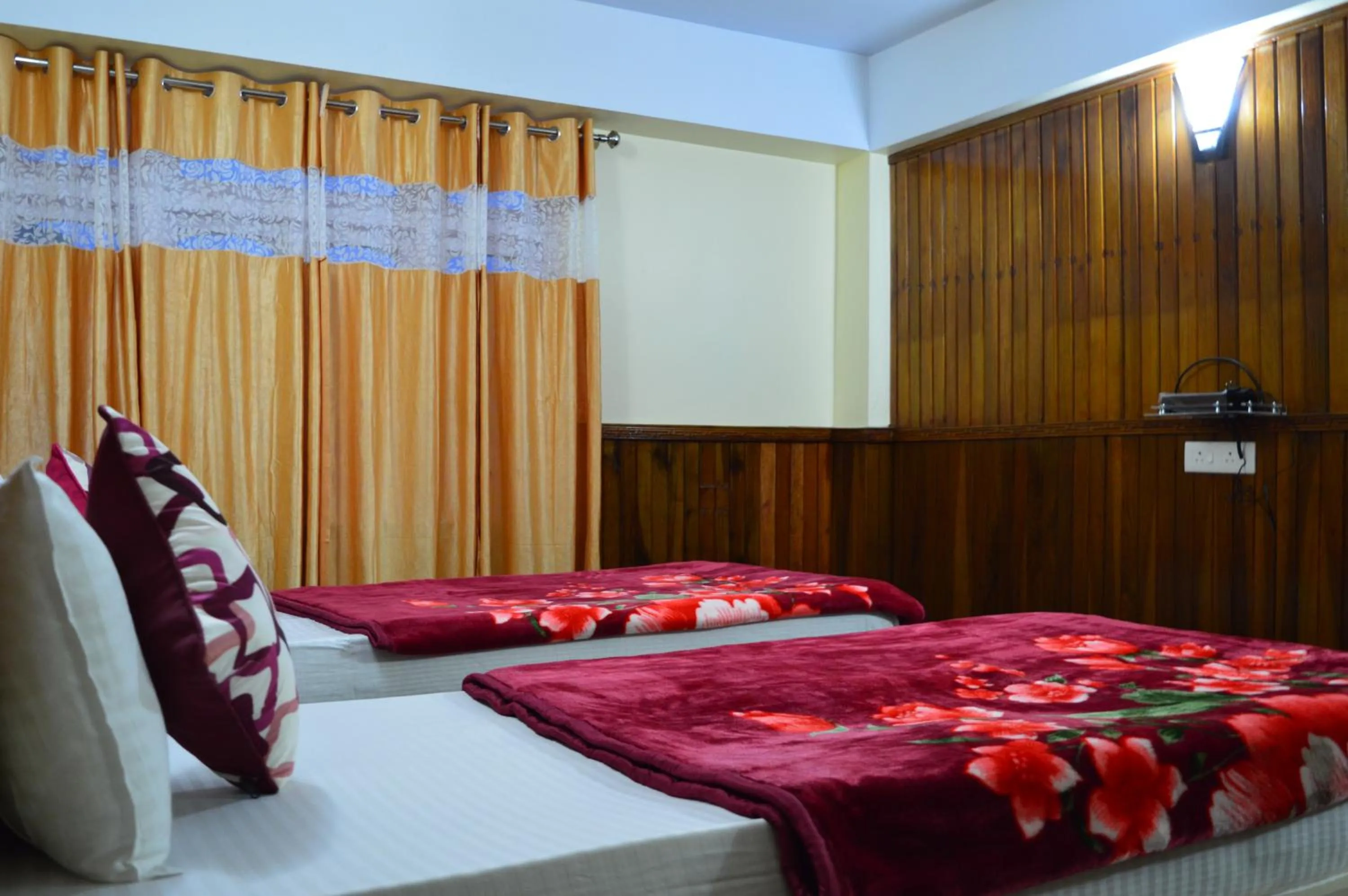 Bed in Hotel Golden Sunrise & Spa