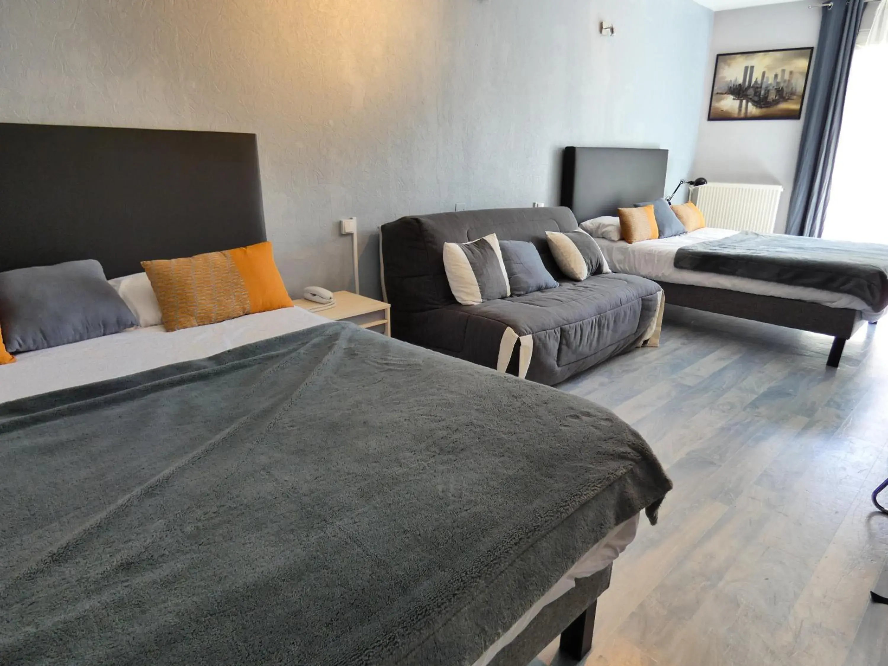 Bed in Logis Hôtel Emeraude Bed in Logis Hôtel Emeraude