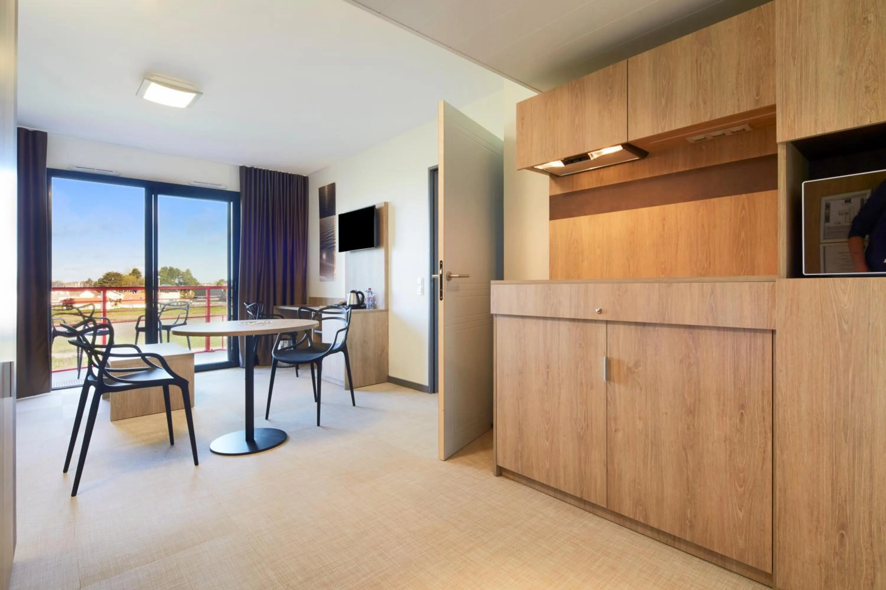 Living room in Kyriad Prestige Residence & Spa Cabourg-Dives-sur-Mer