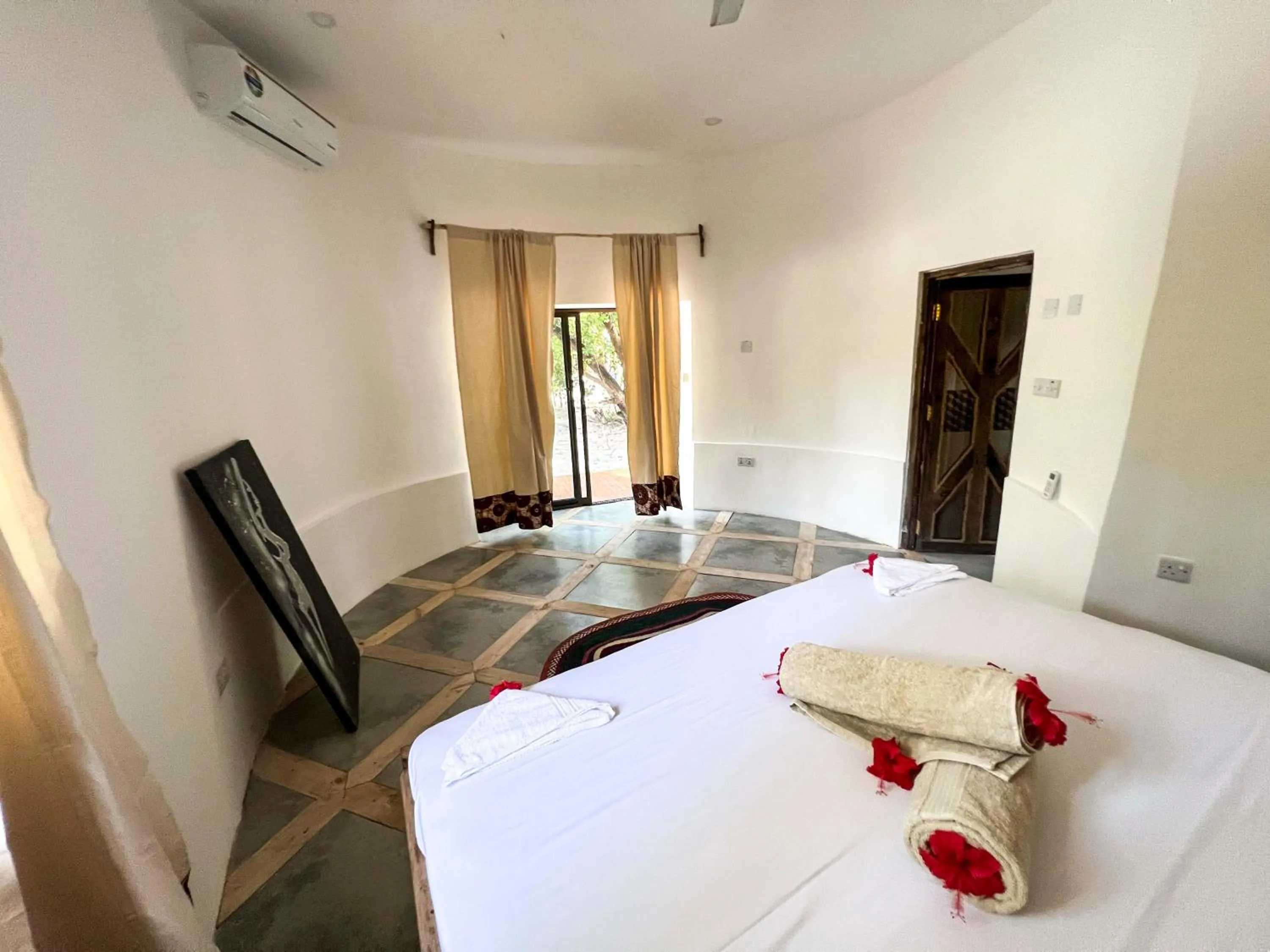 Bed in Kinazi Upepo Beach Eco Sport Resort