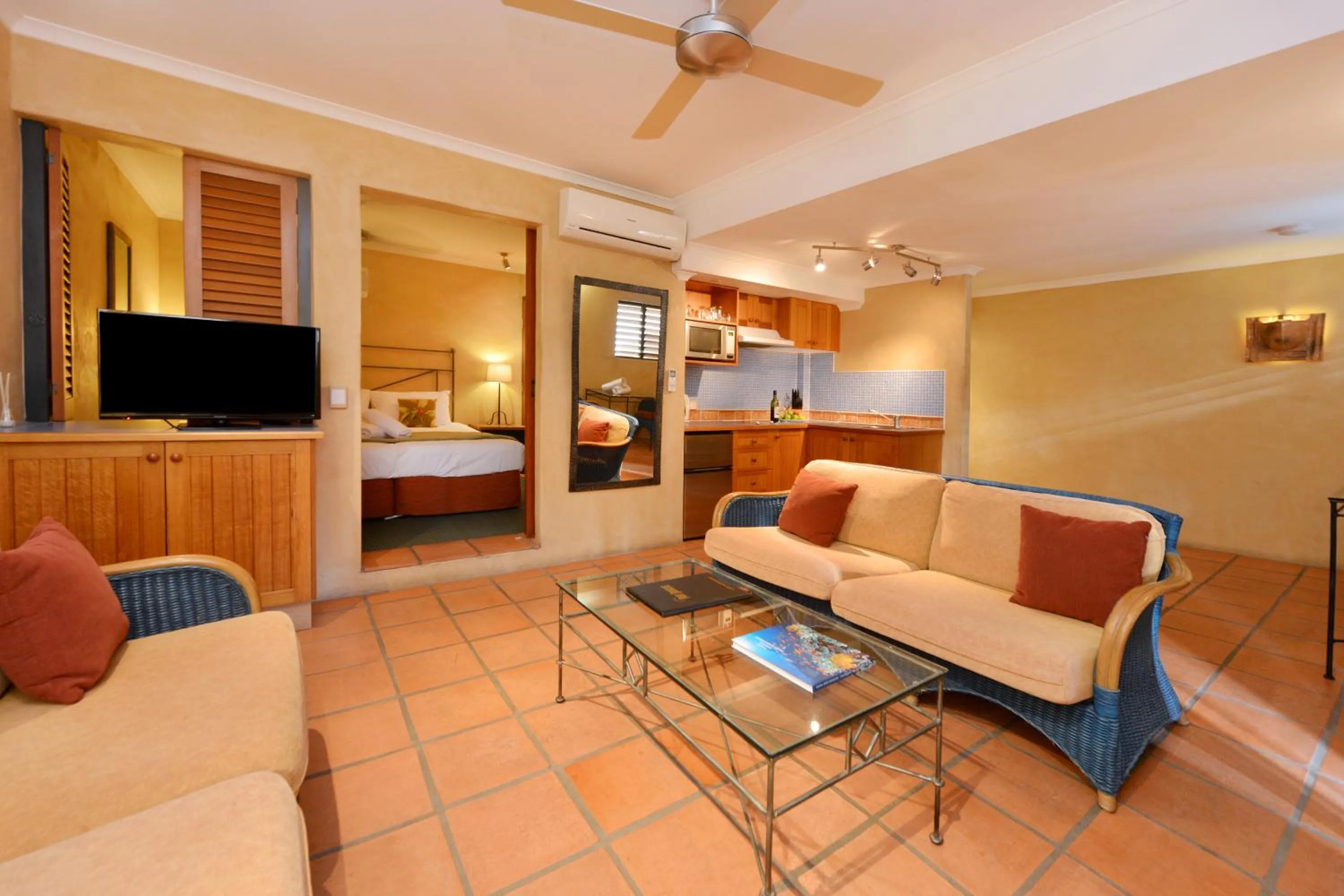 Kitchen or kitchenette, Bed in Seascape Apartments at Villa San Michele