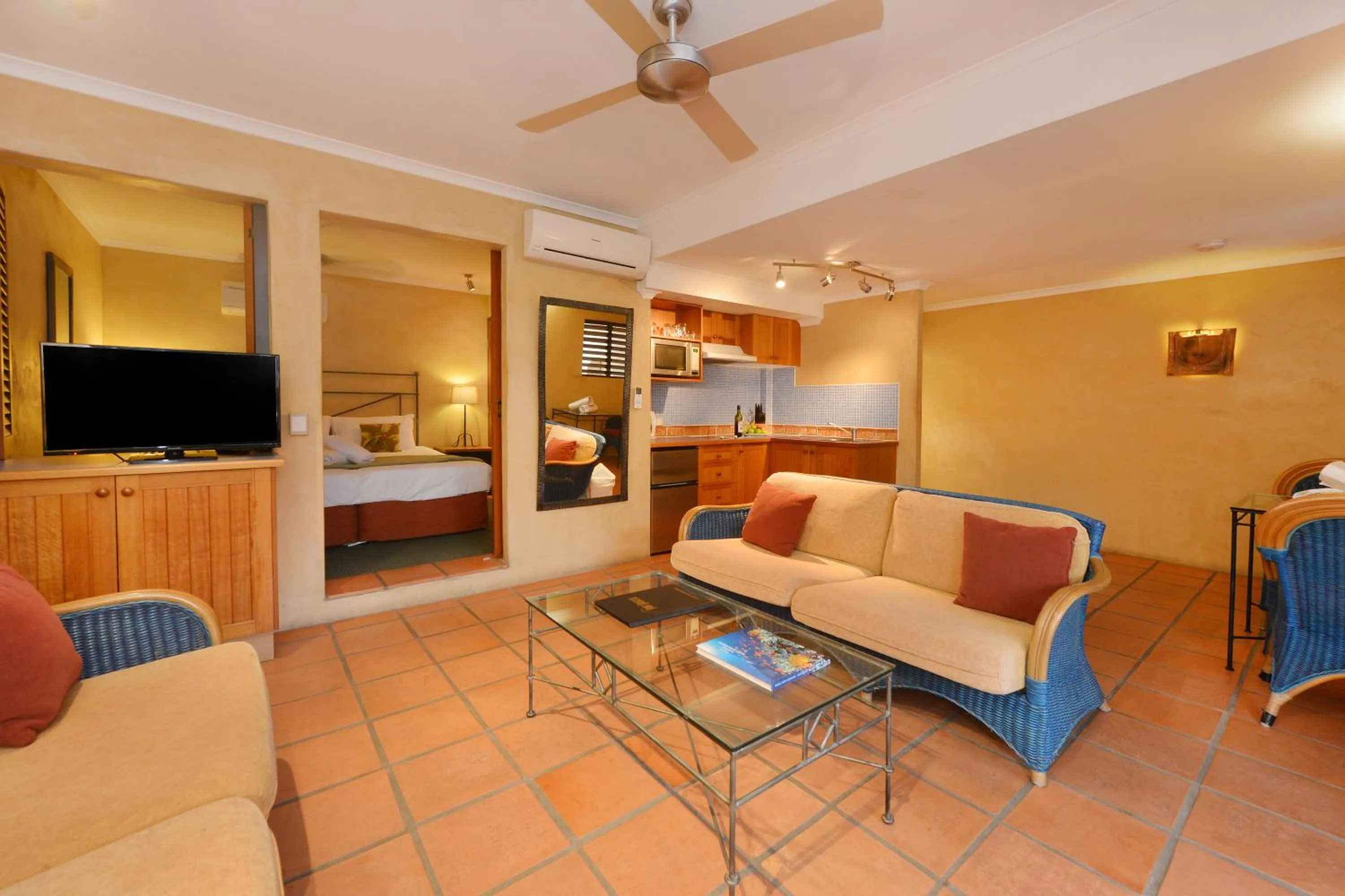 Kitchen or kitchenette, Bed in Seascape Apartments at Villa San Michele