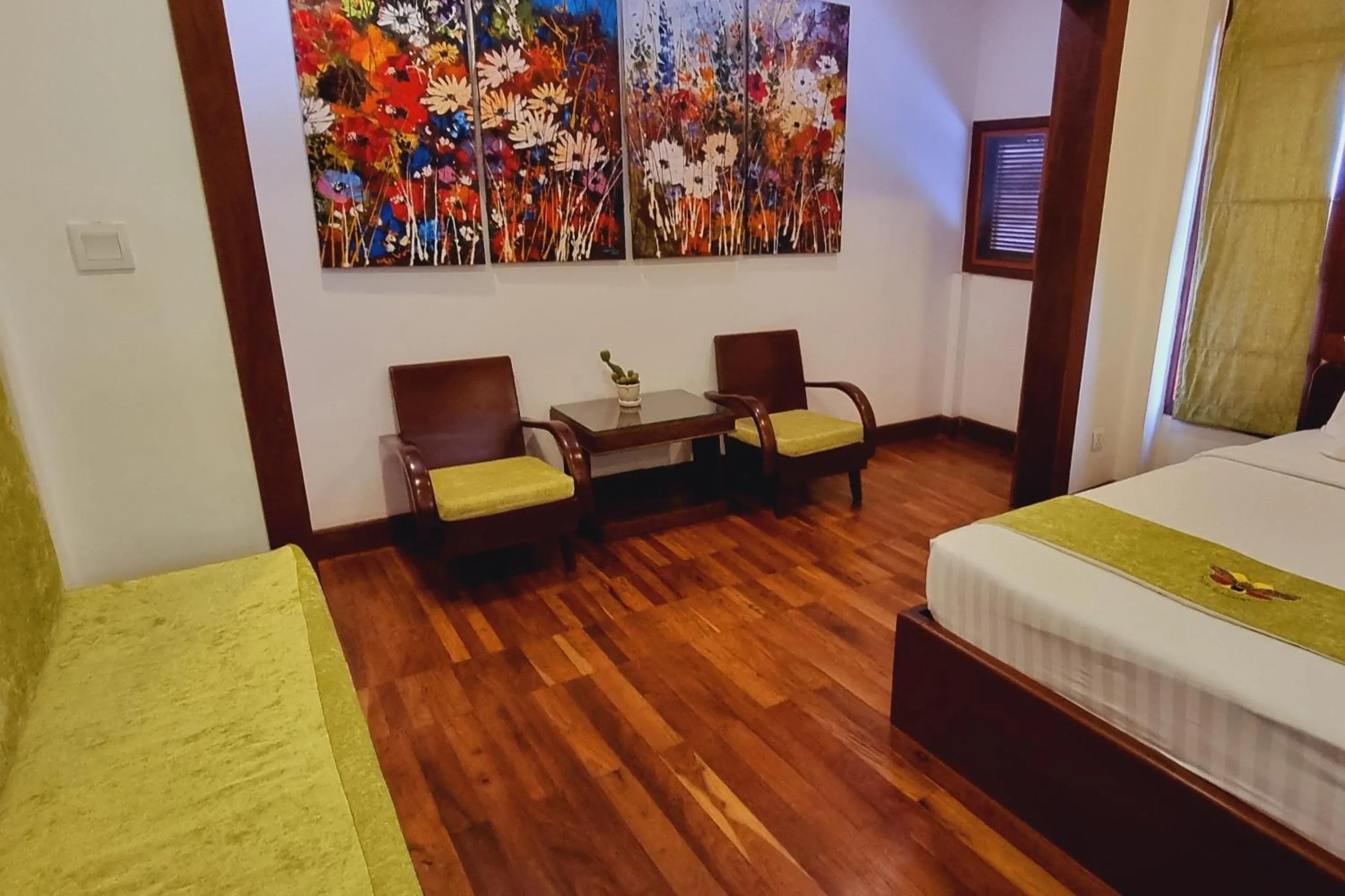 Seating area, Bed in Víd Angkor Boutique