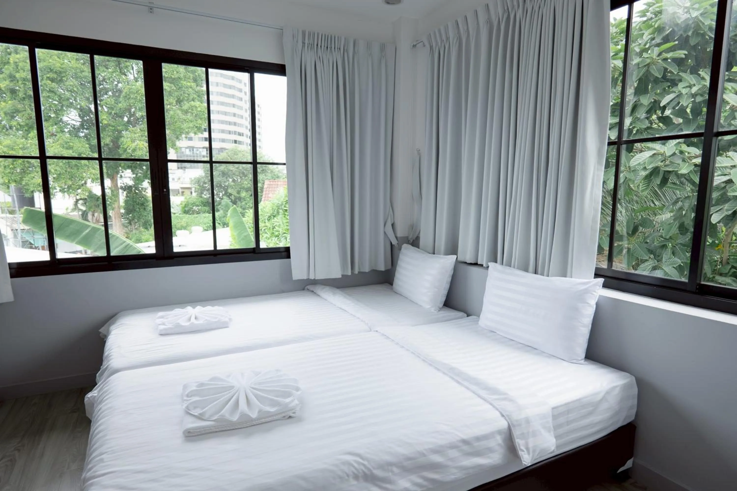 Bed in Surachet at 257 Boutique House