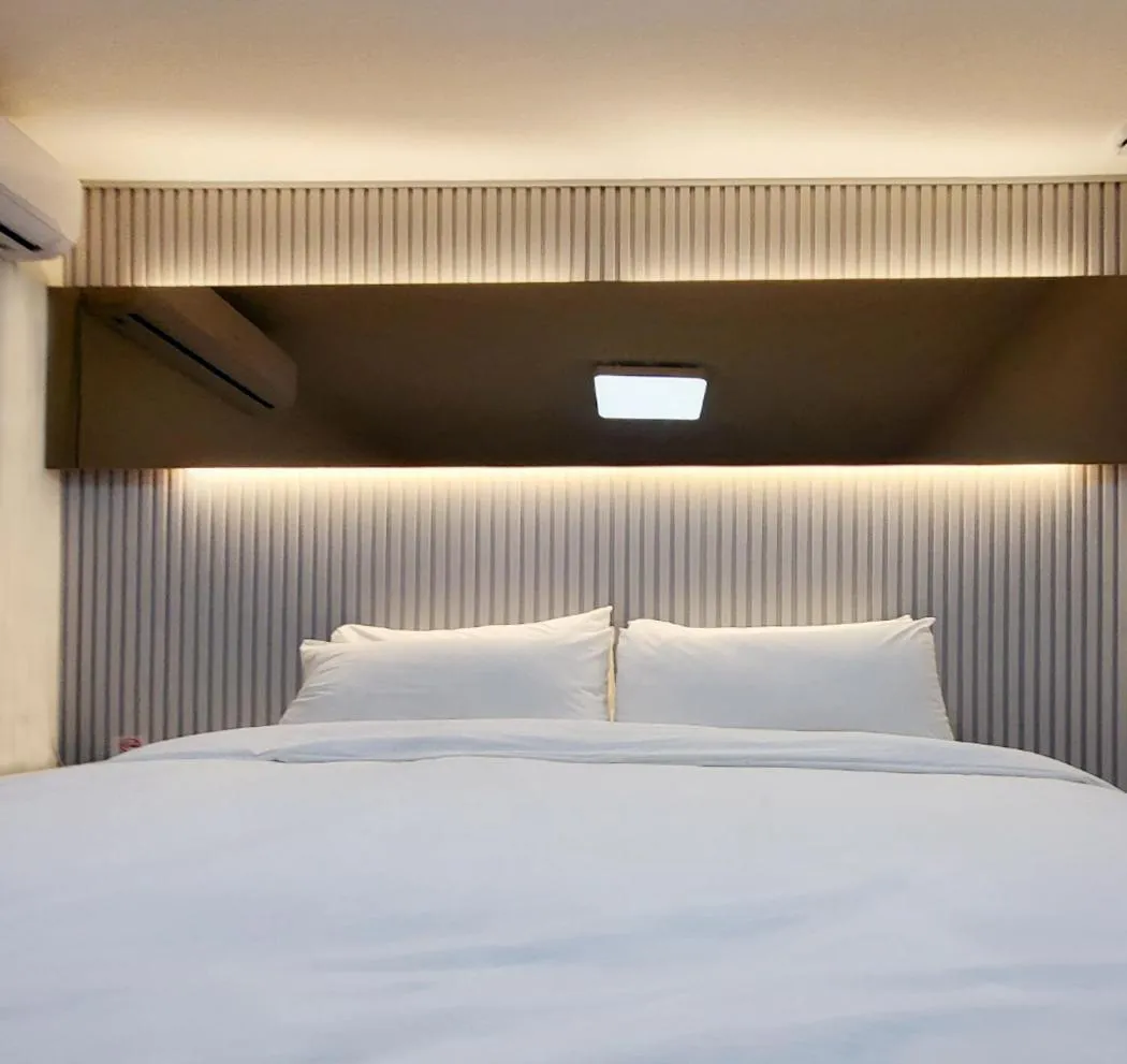 Bed in Penatess Pool Villa