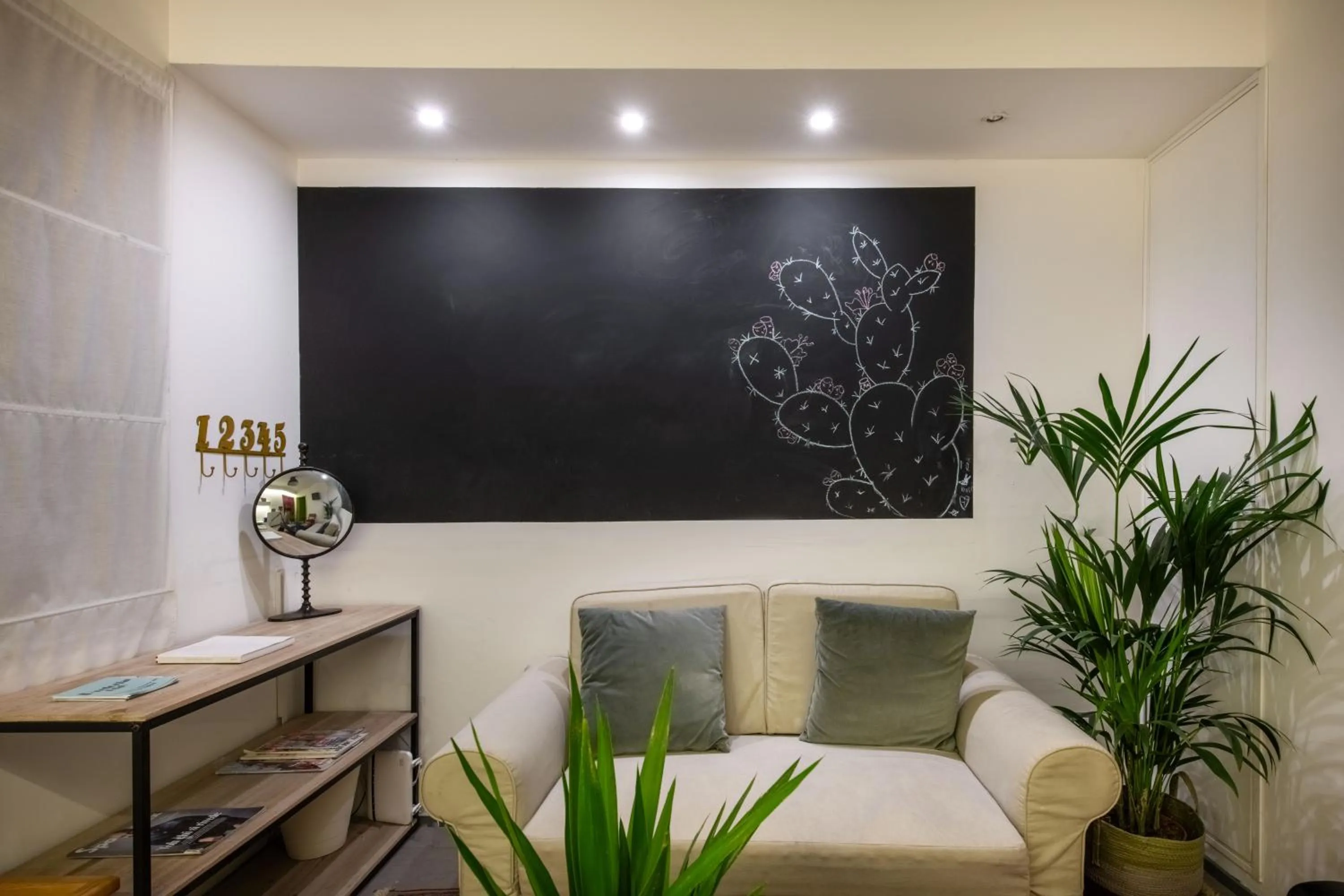 Communal lounge/ TV room in Pretoria Rooms