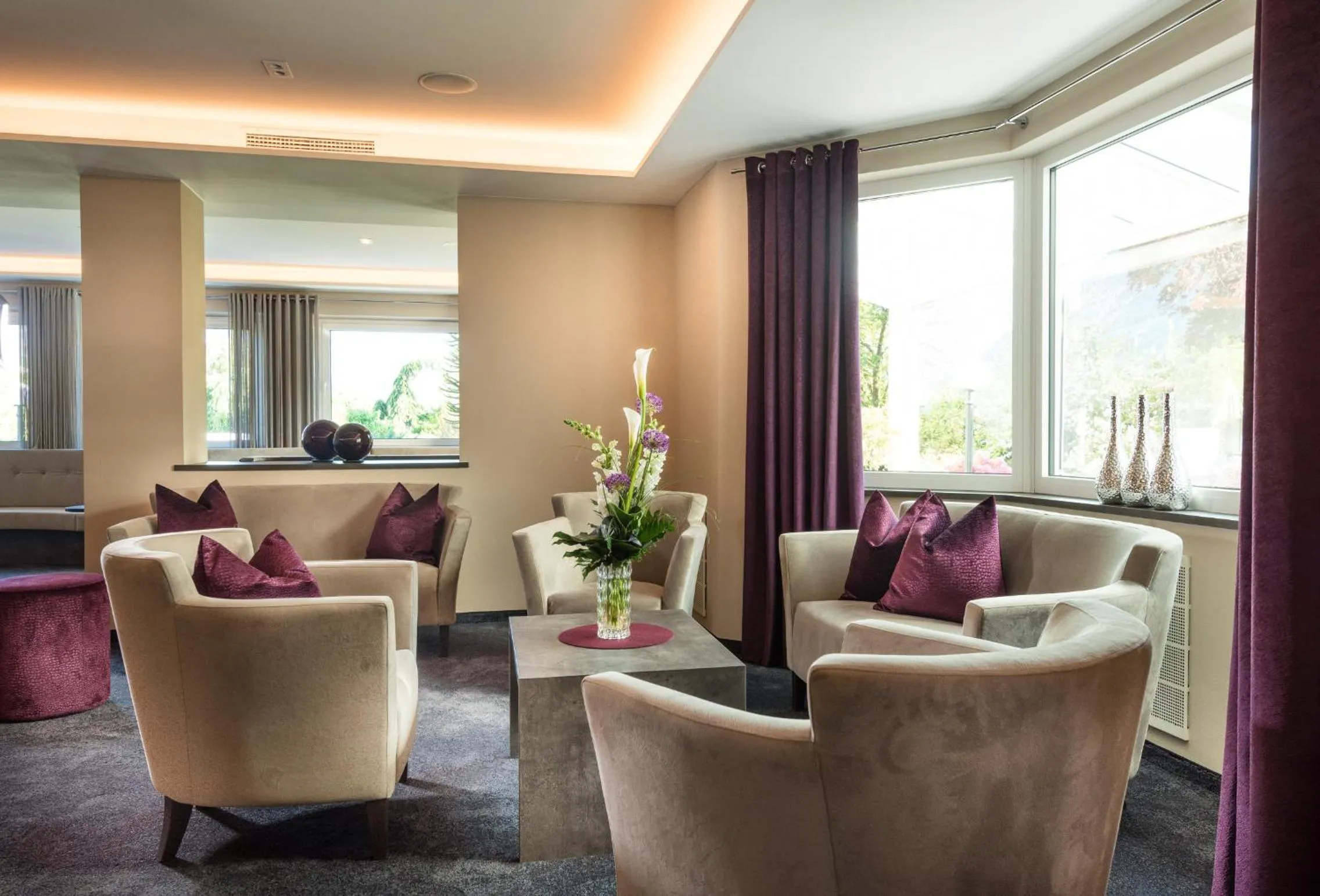 Communal lounge/ TV room in FAYN garden retreat hotel