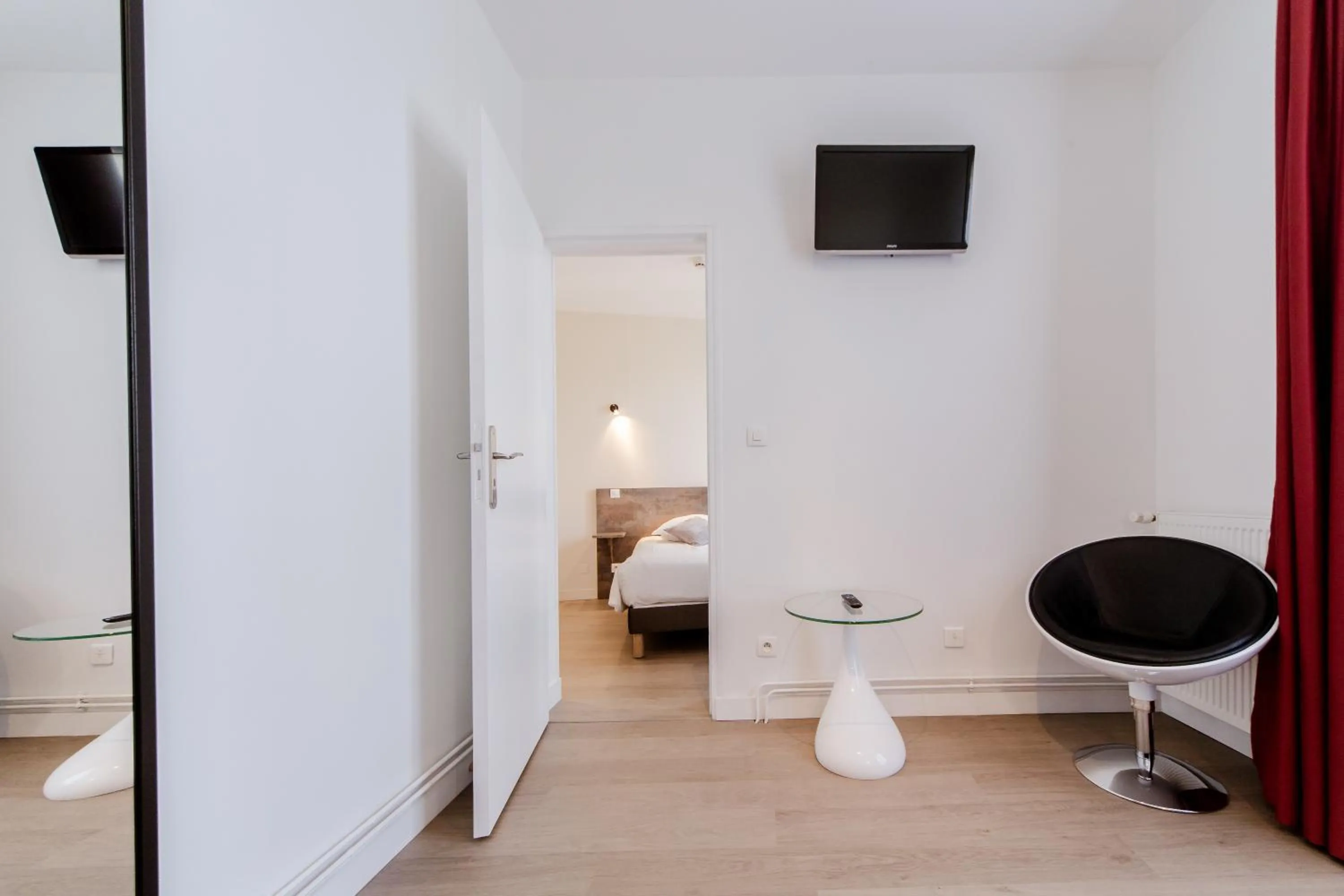 Photo of the whole room, Bed in LOGIS HOTEL - Le Petit Bellon