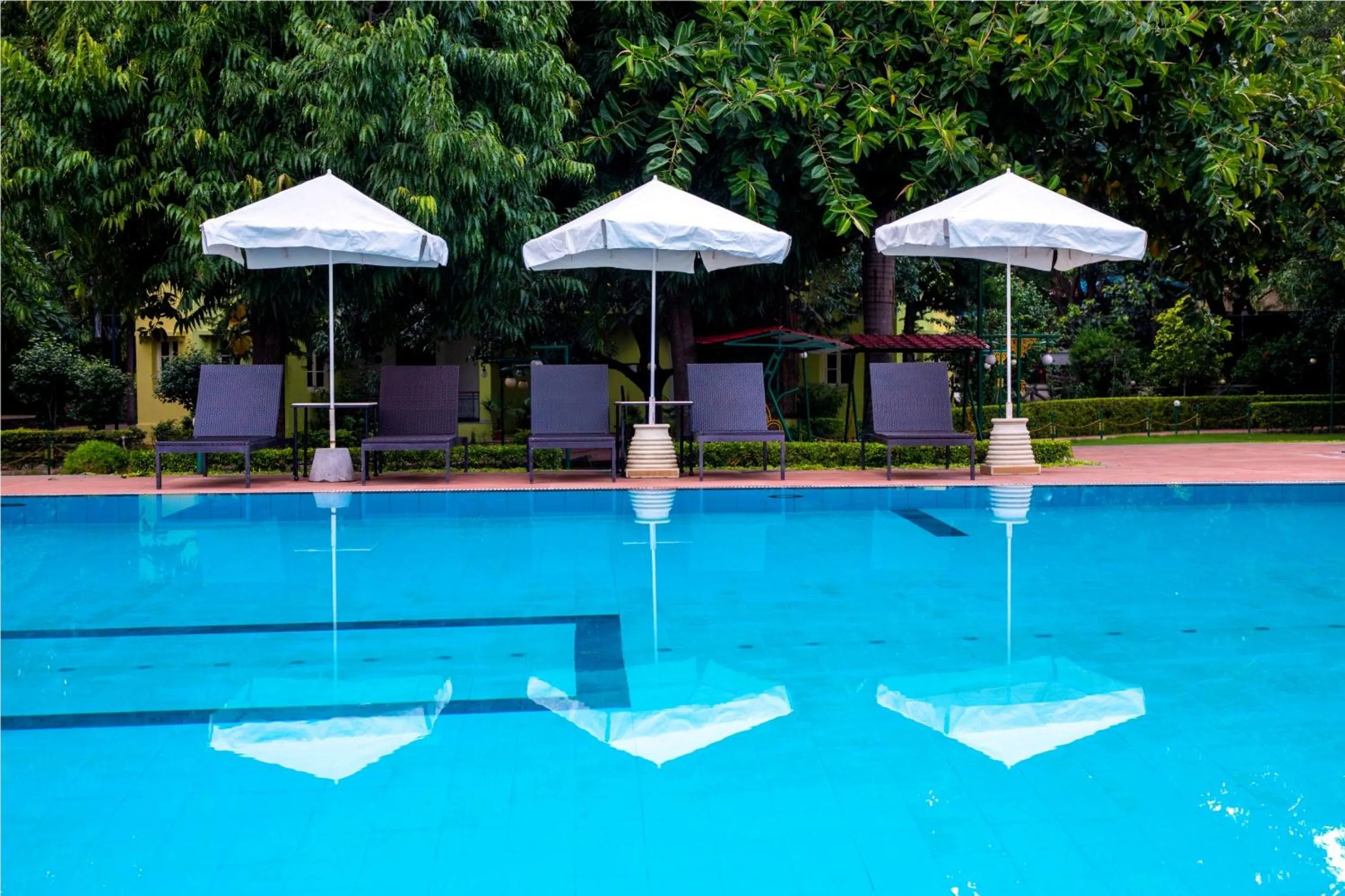 Swimming pool in Amantra Shilpi Resort & Spa Udaipur