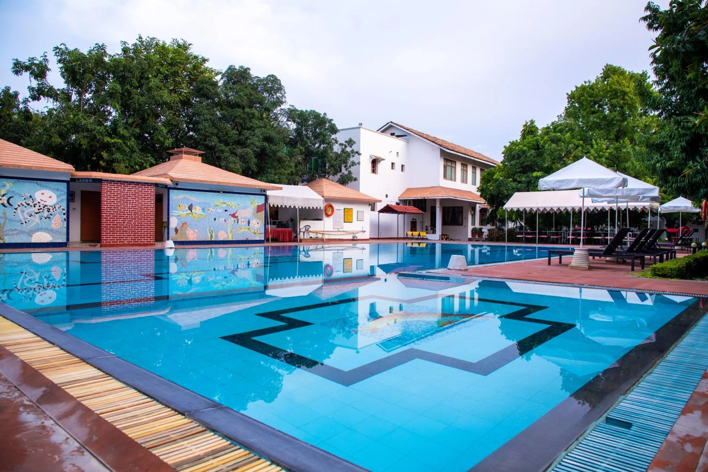 Swimming pool in Amantra Shilpi Resort & Spa Udaipur