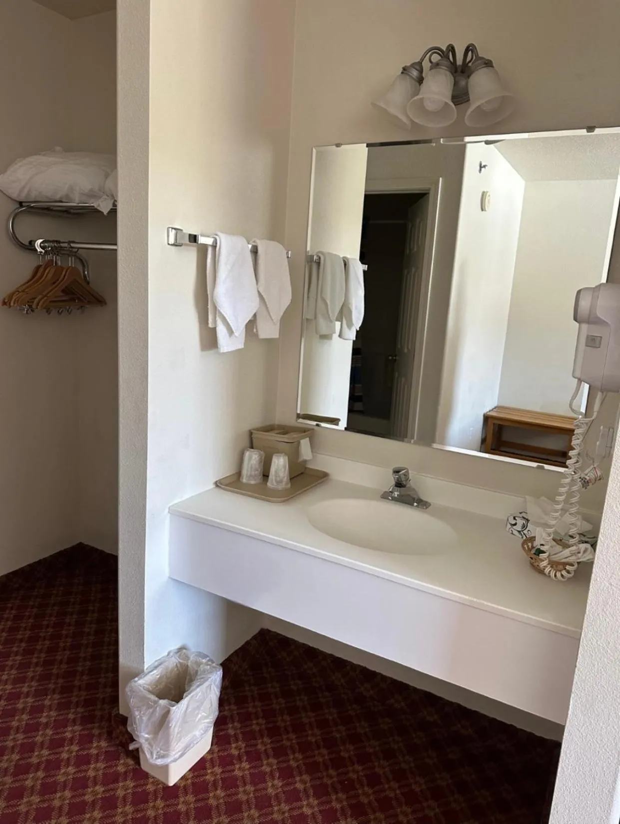 Bed in Columbine Inn and Suites