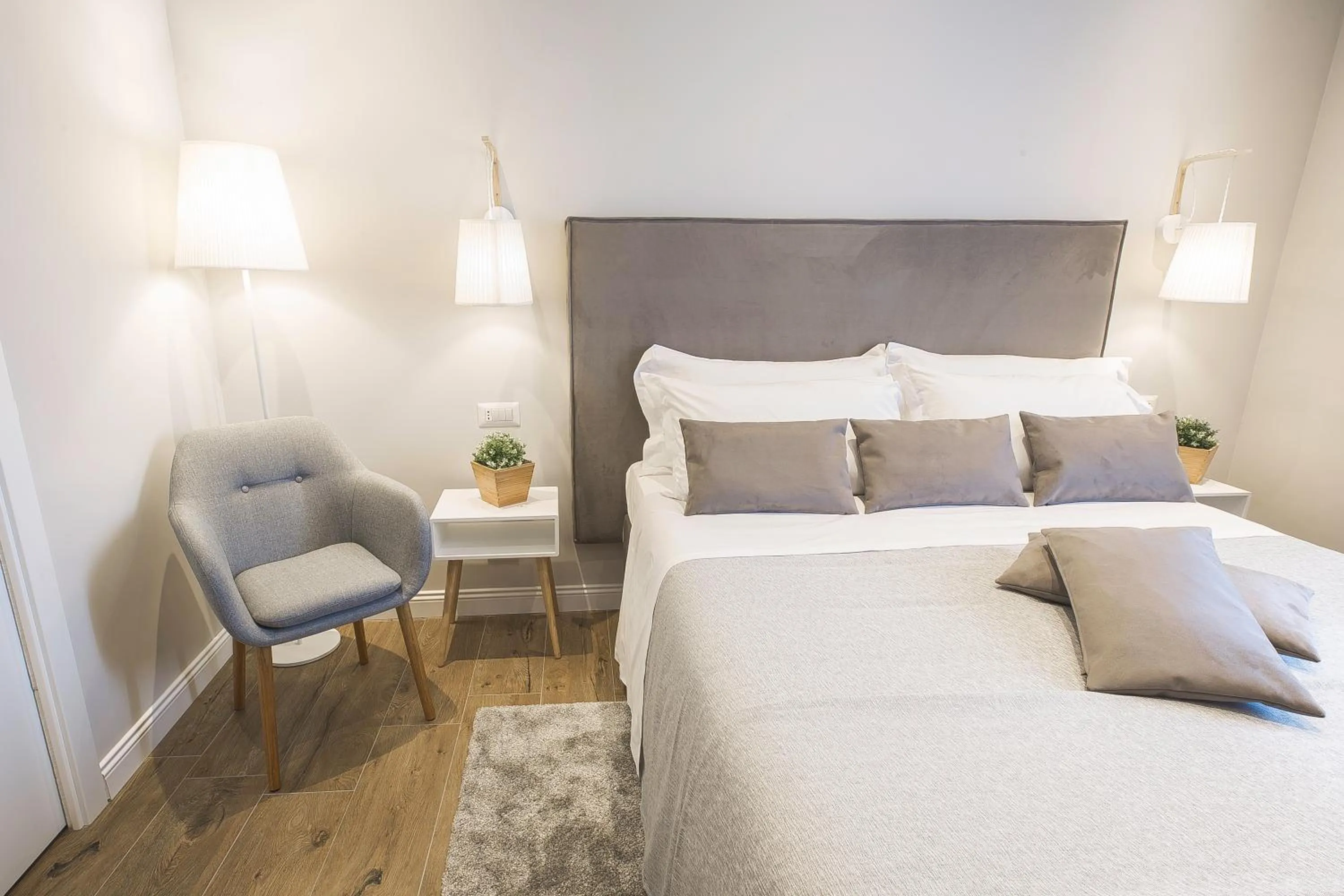 Bed in Colonna Luxury Suites