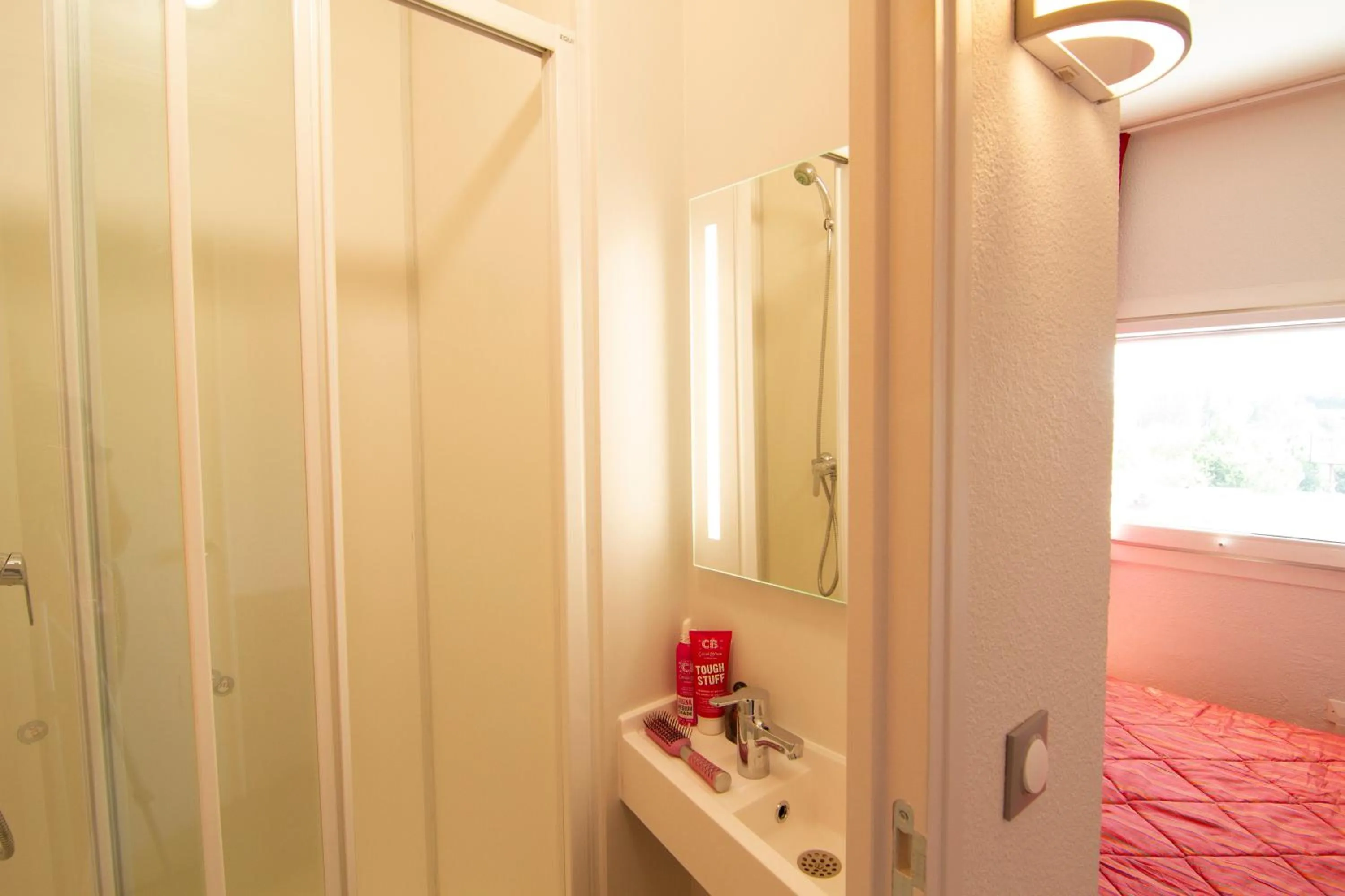 Bathroom in Premiere Classe Angers Est - St Barthelemy D'Anjou