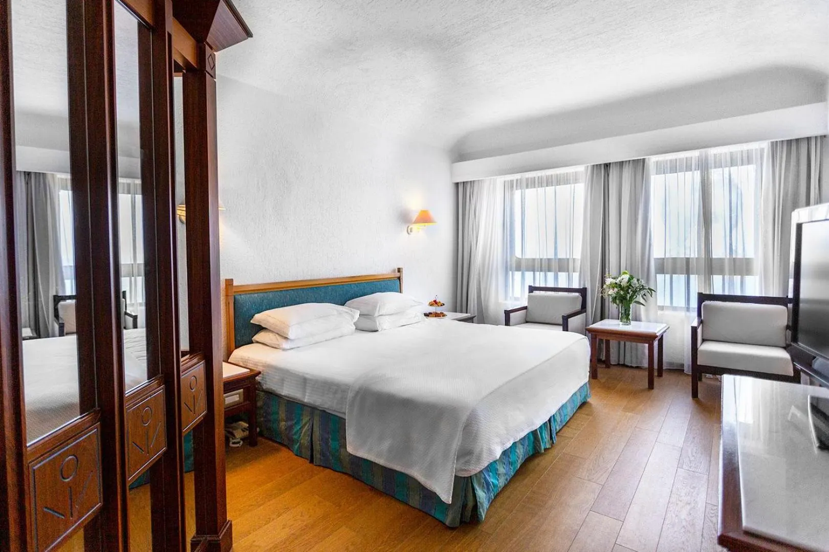 Photo of the whole room, Bed in Coral Beach Hotel & Resort Cyprus