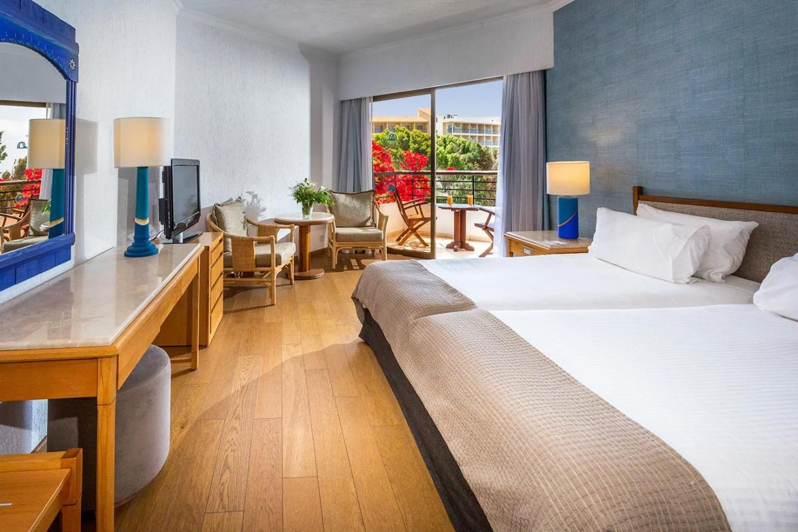 Photo of the whole room, Bed in Coral Beach Hotel & Resort Cyprus