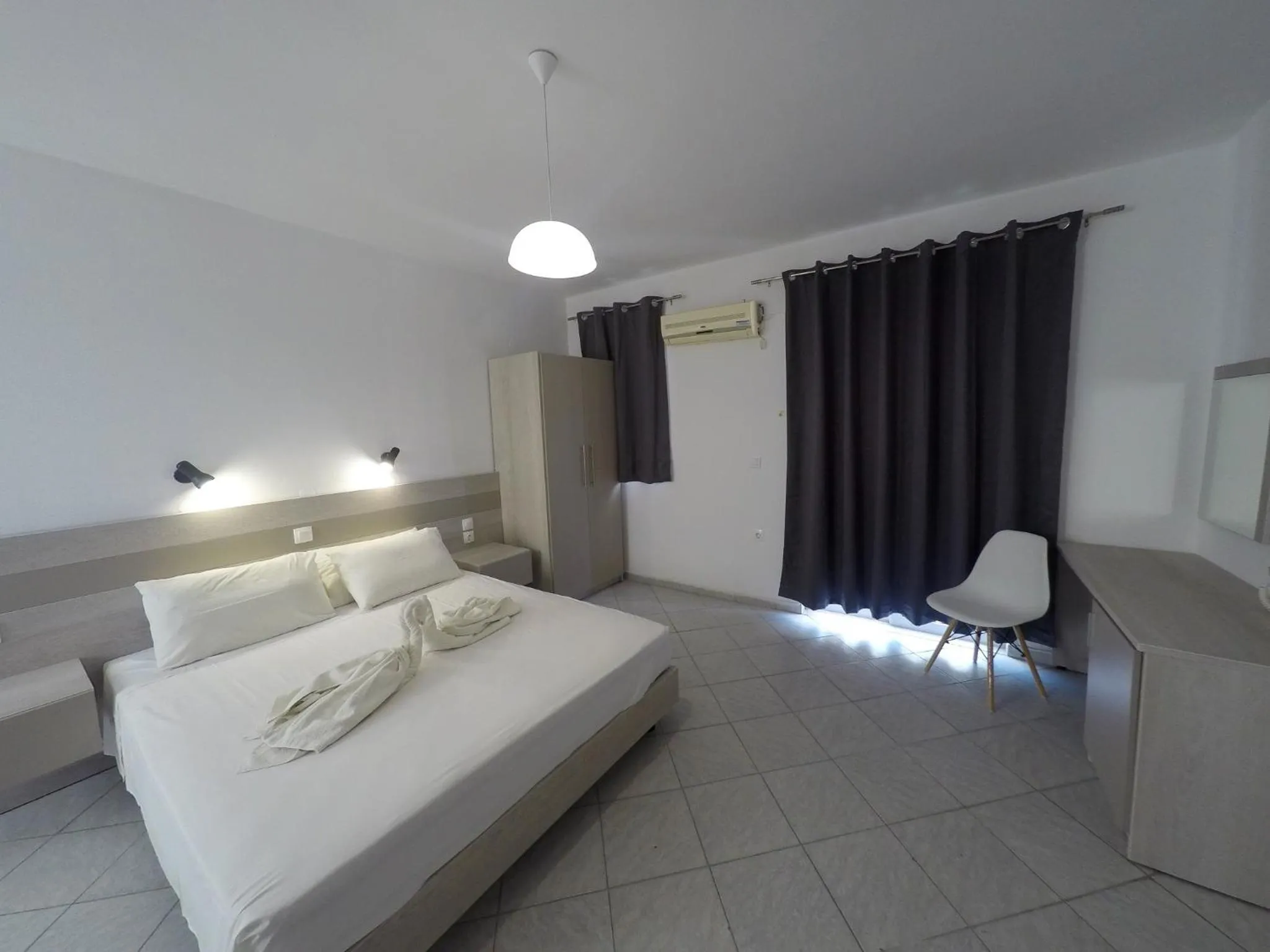 Bed in Harriets Apartments