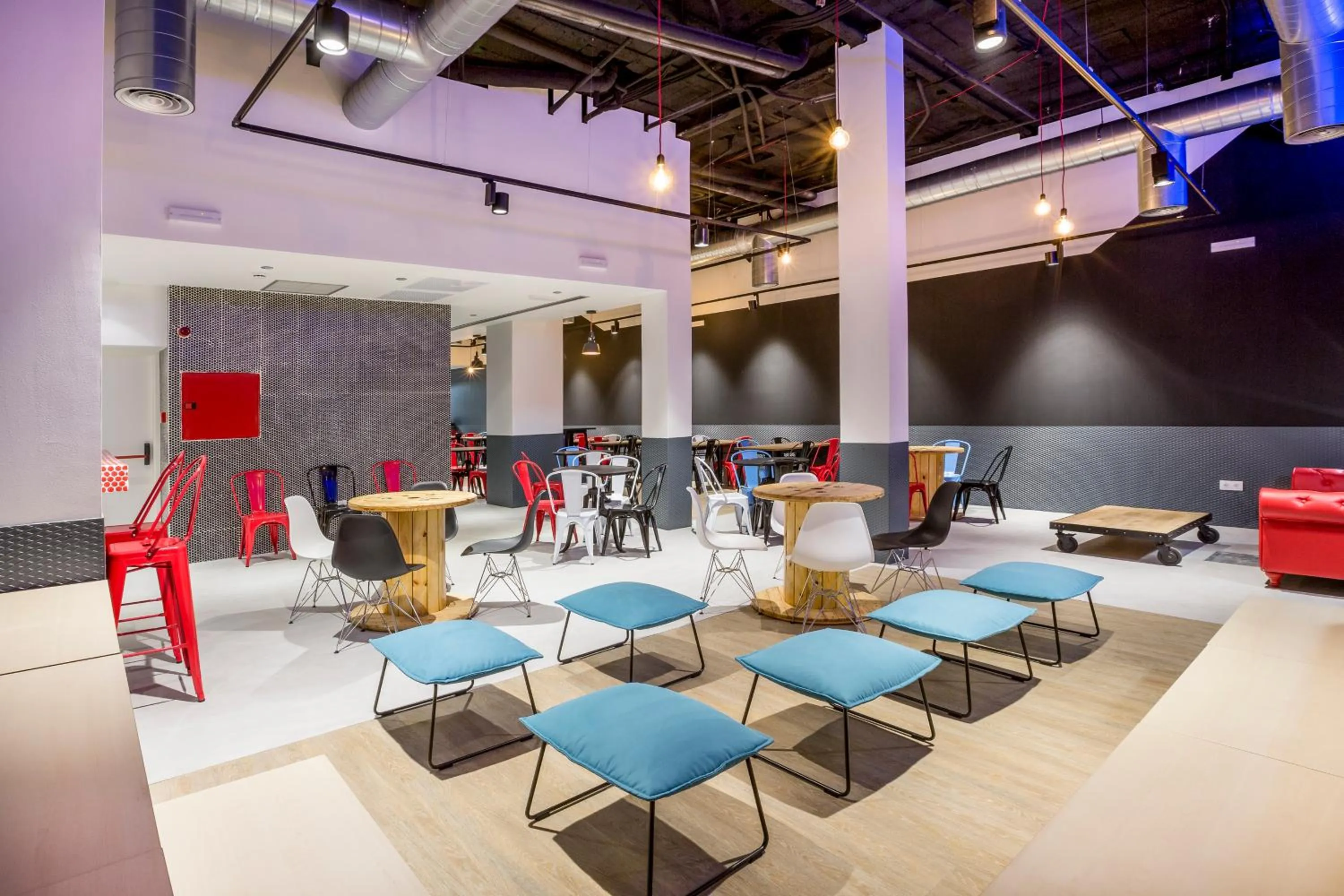 Communal lounge/ TV room in Mola Hostel