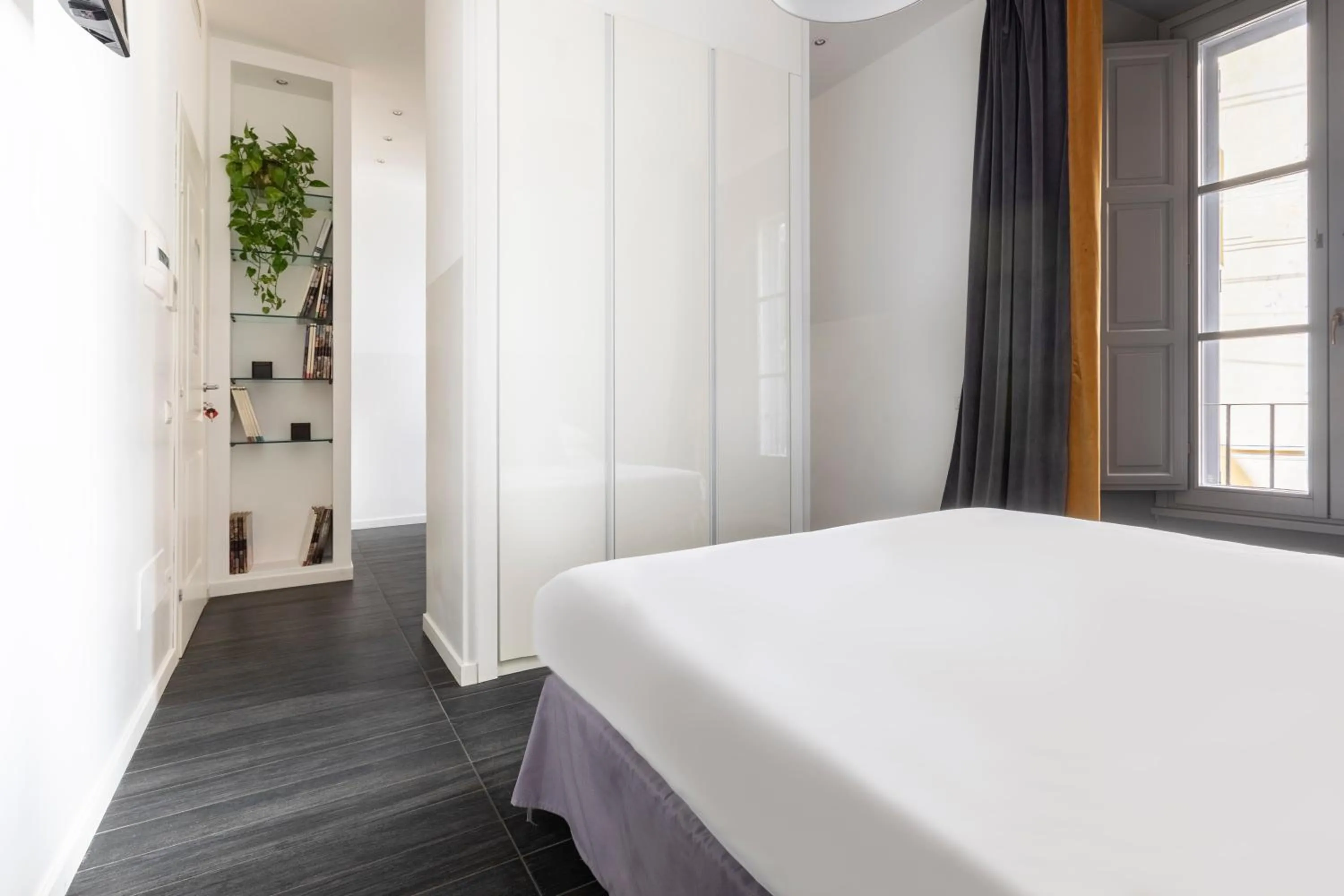 Photo of the whole room, Bed in Vatican City Suites by Hili