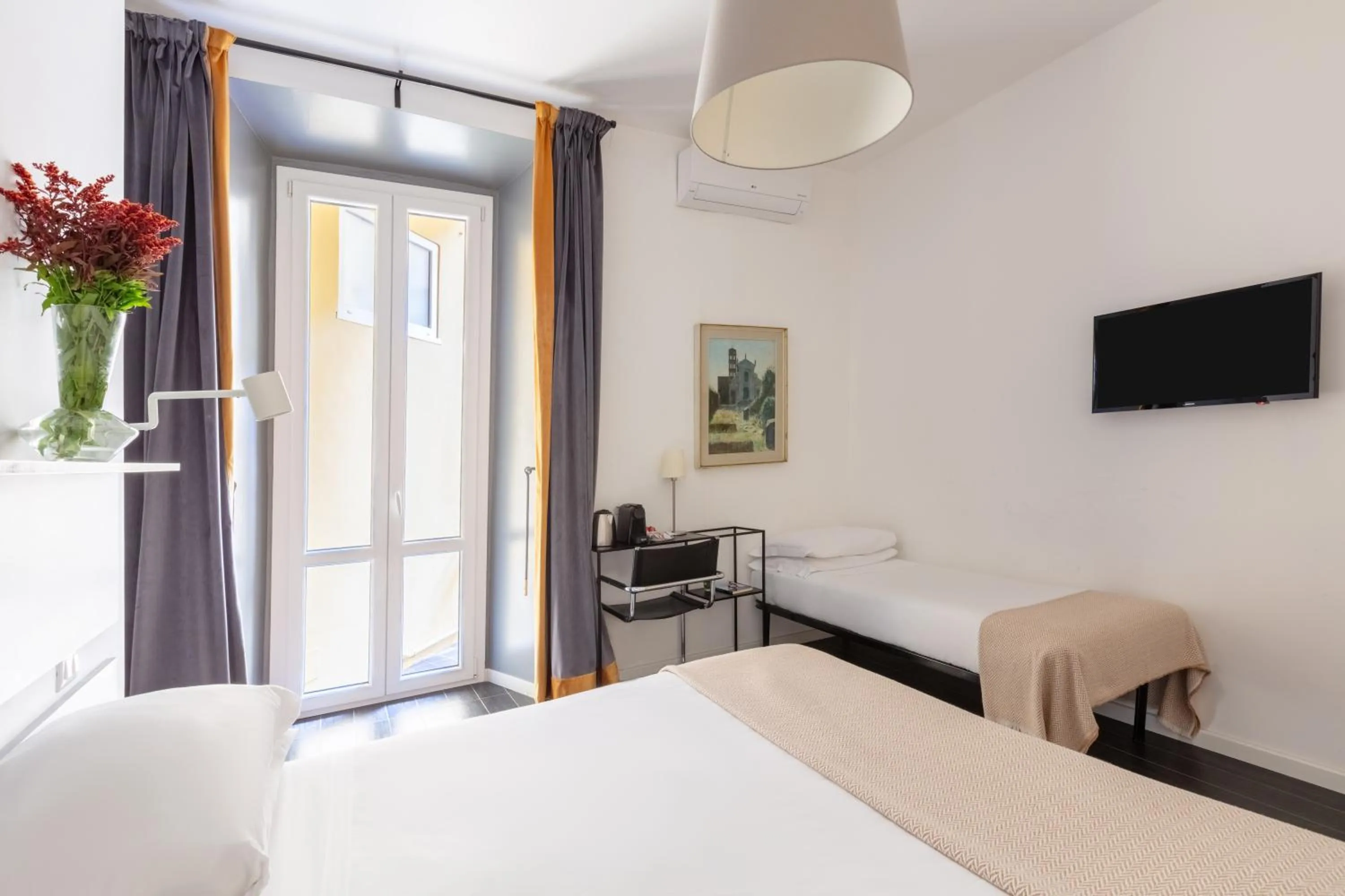 Bed in Vatican City Suites by Hili