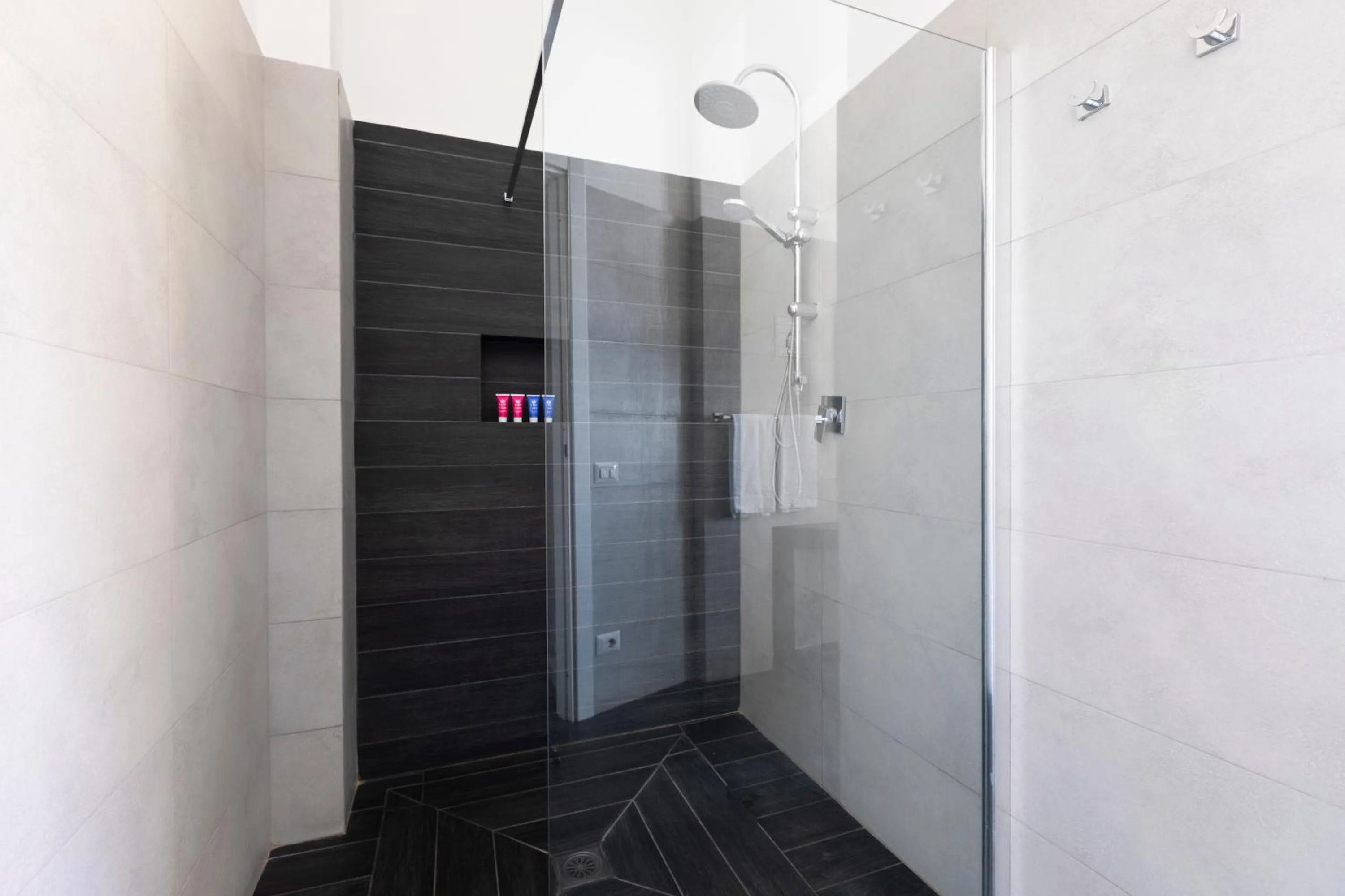 Shower in Vatican City Suites by Hili