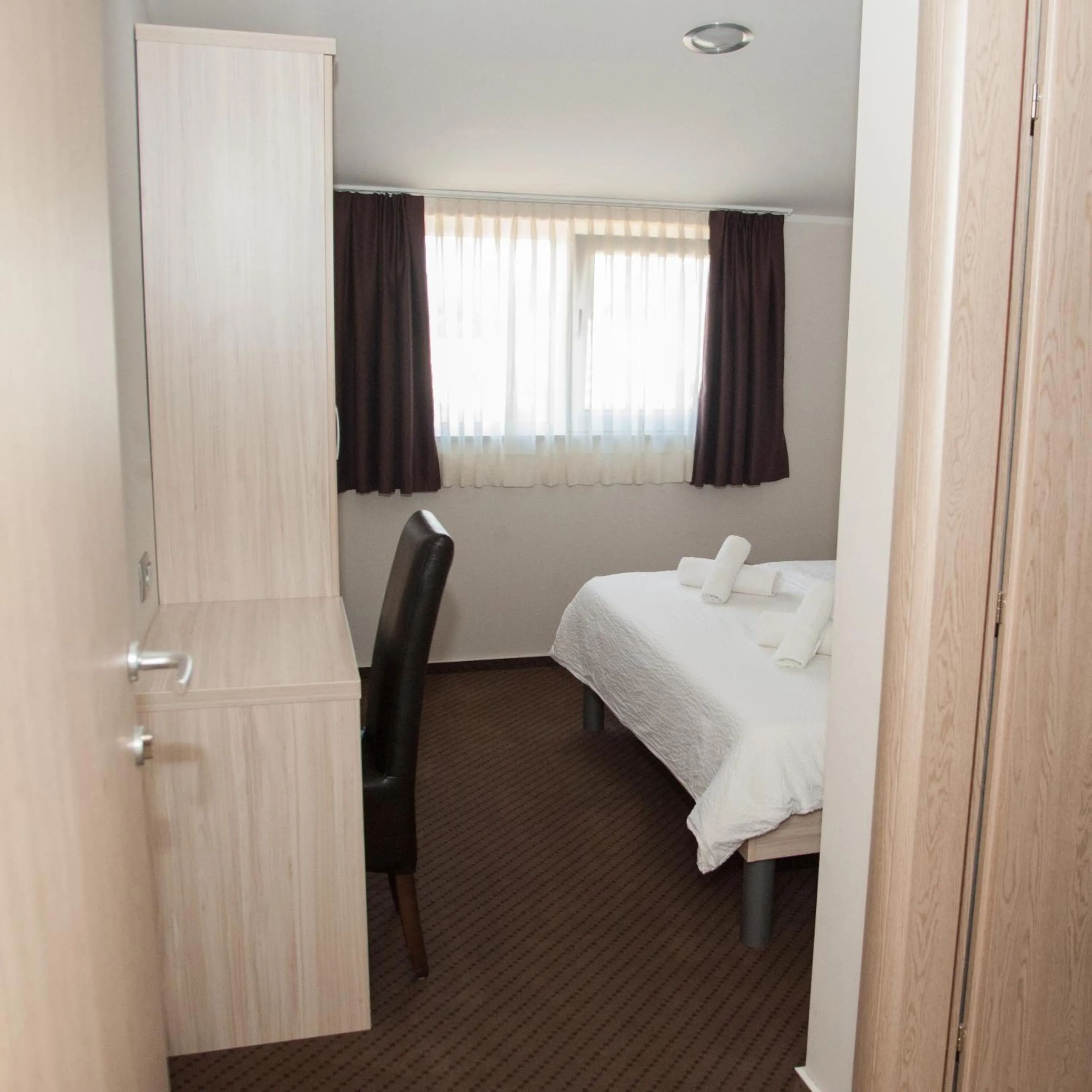 View (from property/room), Bed in Hotel Glorija