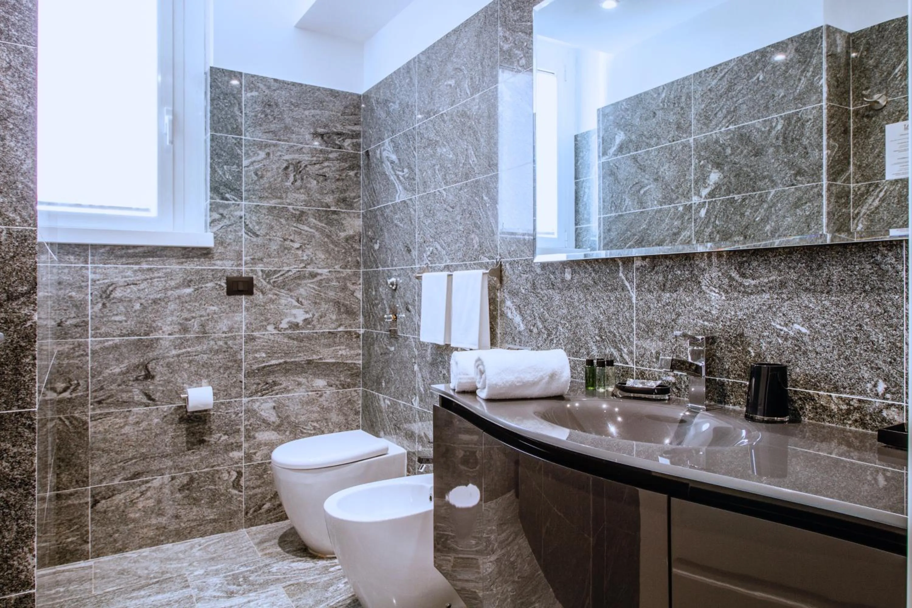 Bathroom in Aiello Rooms