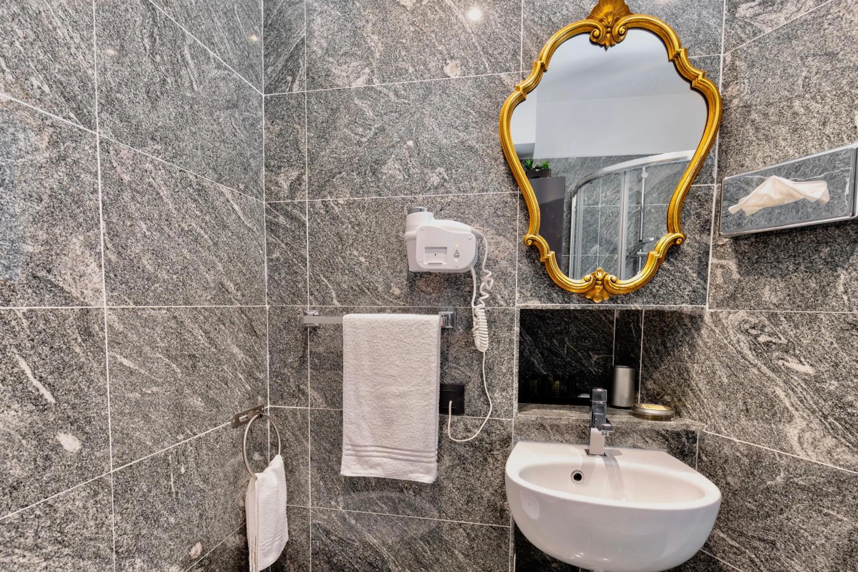 Bathroom in Aiello Rooms