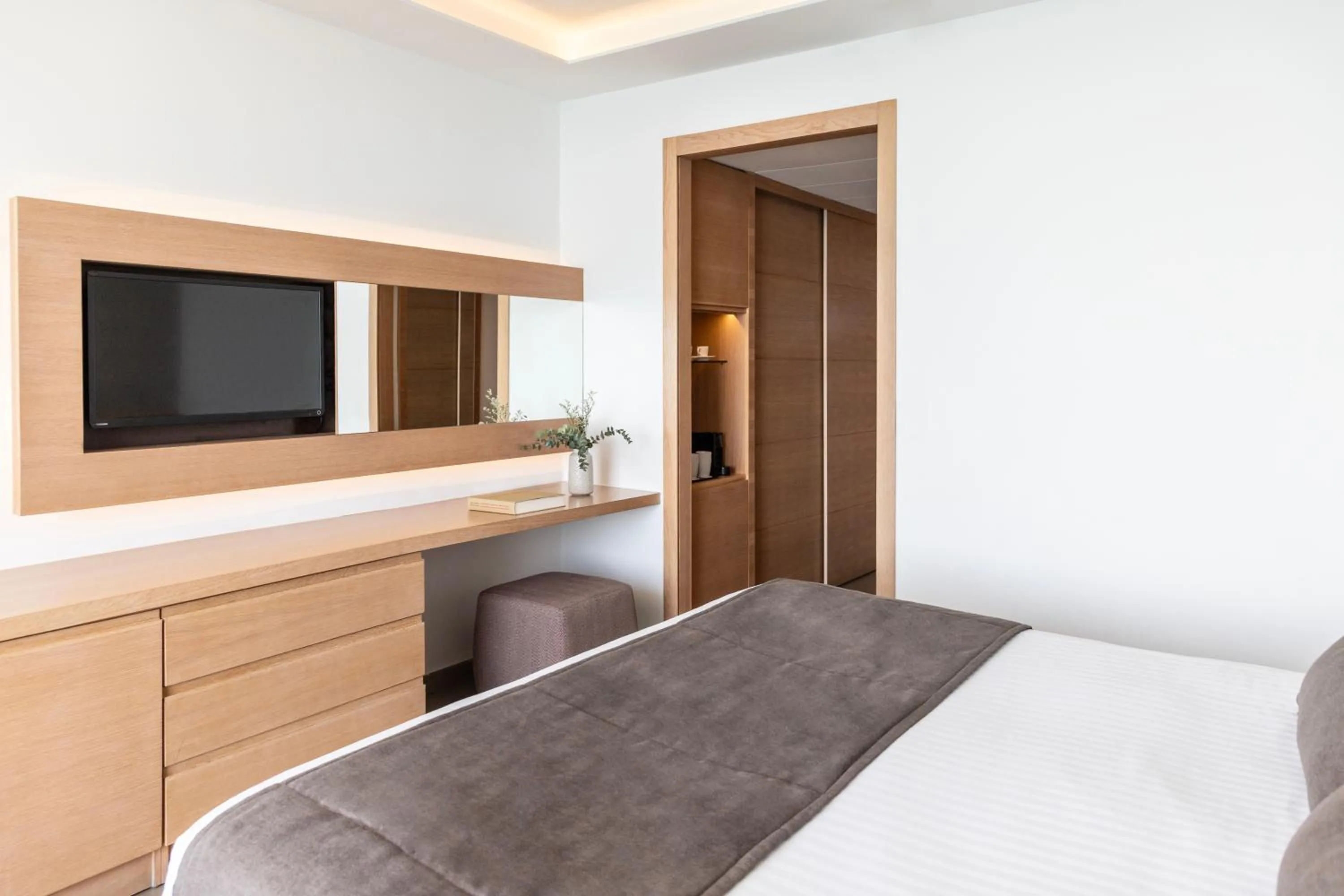 Bed in Royal Apollonia by Louis Hotels