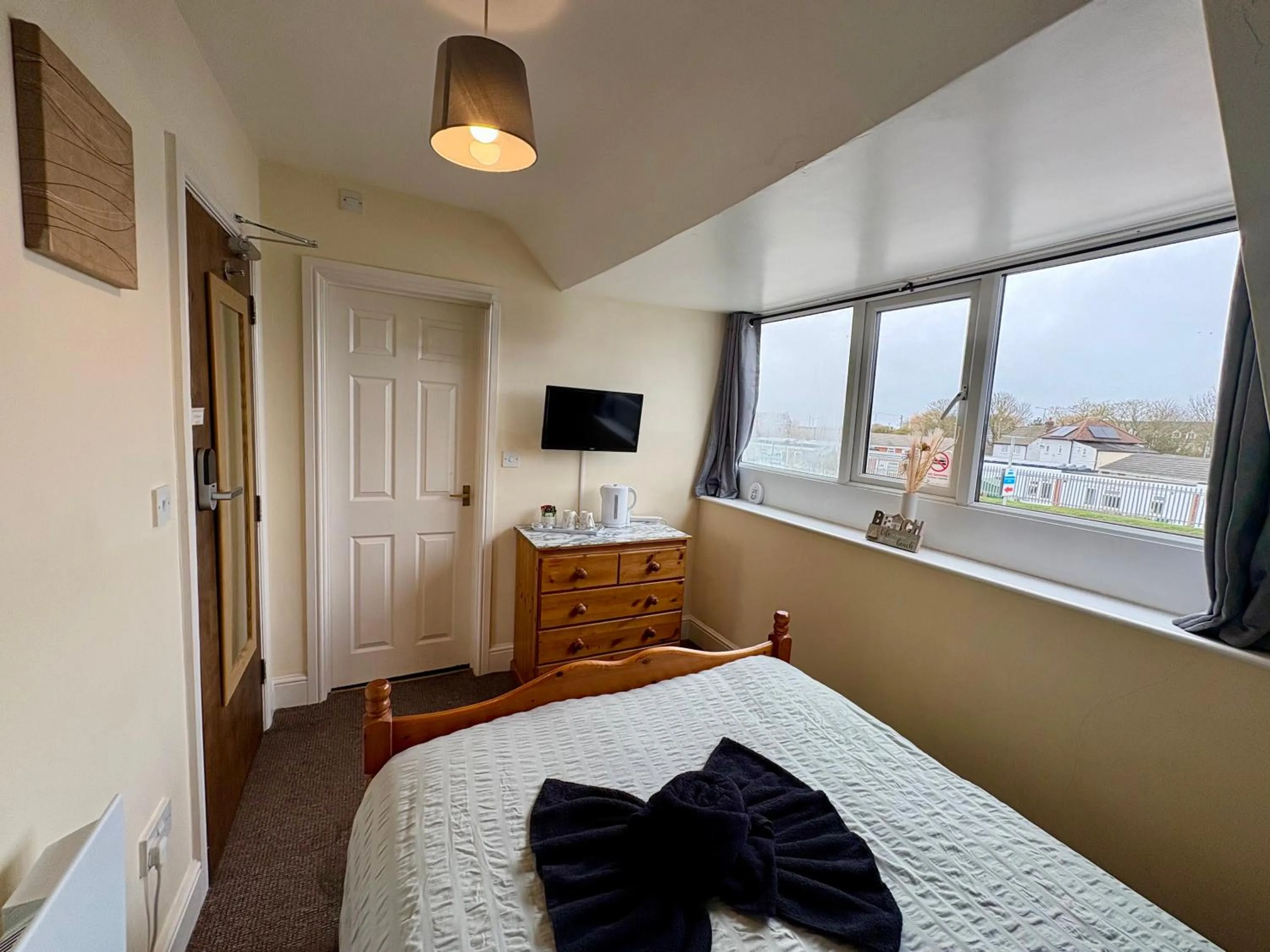 Bed in Travellers Rest Motel