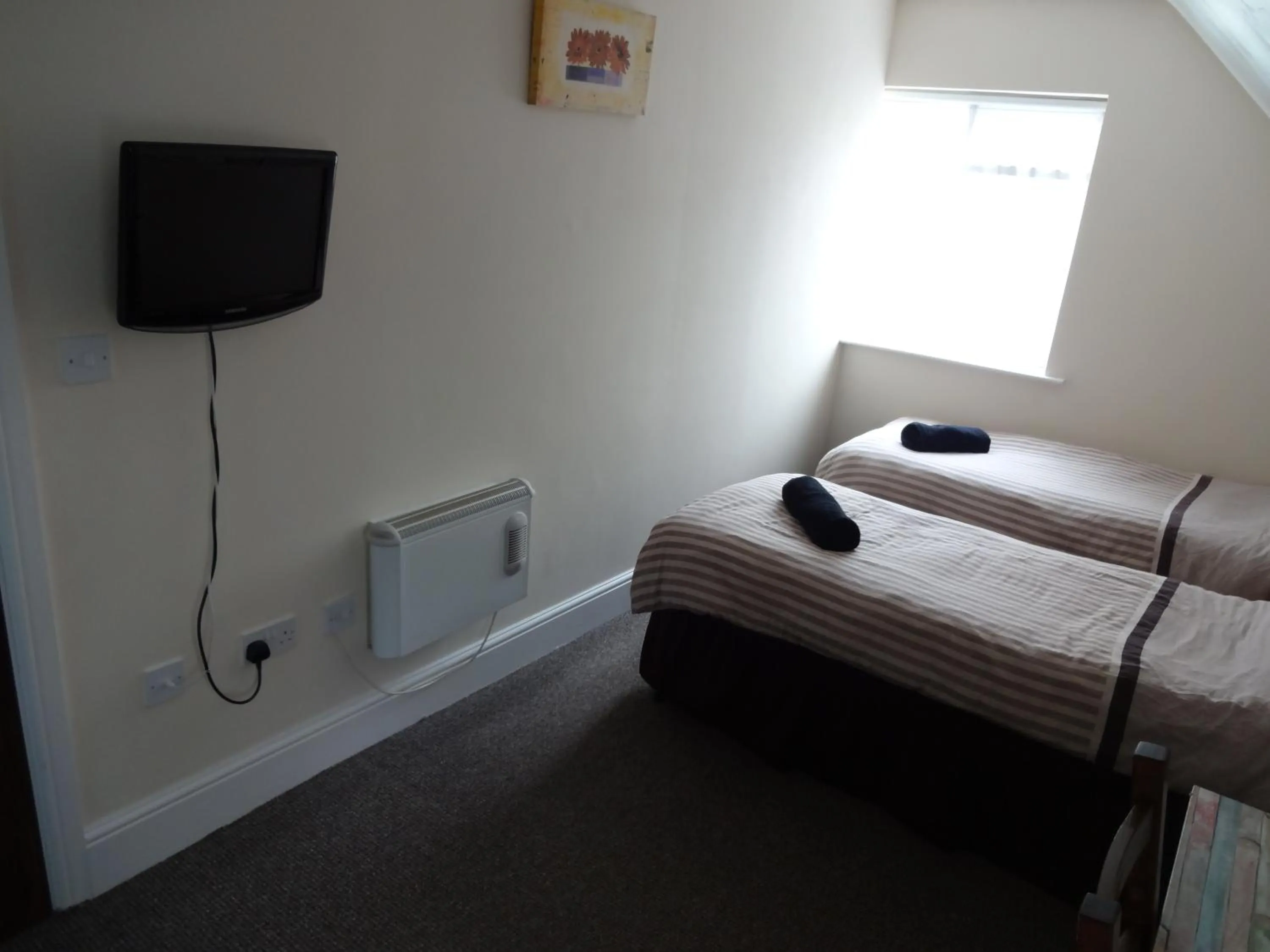 Bed in Travellers Rest Motel