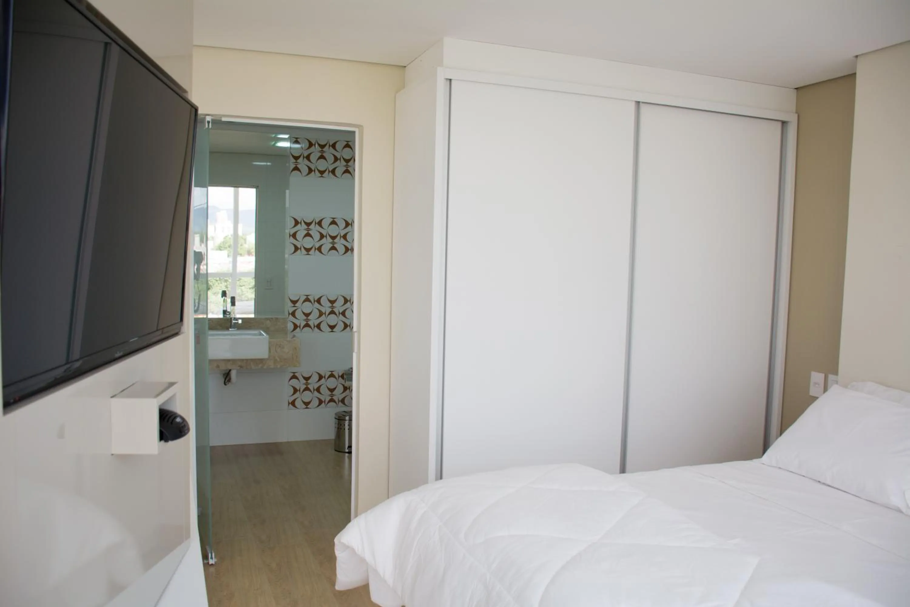 Bedroom, Bed in Select Hotel