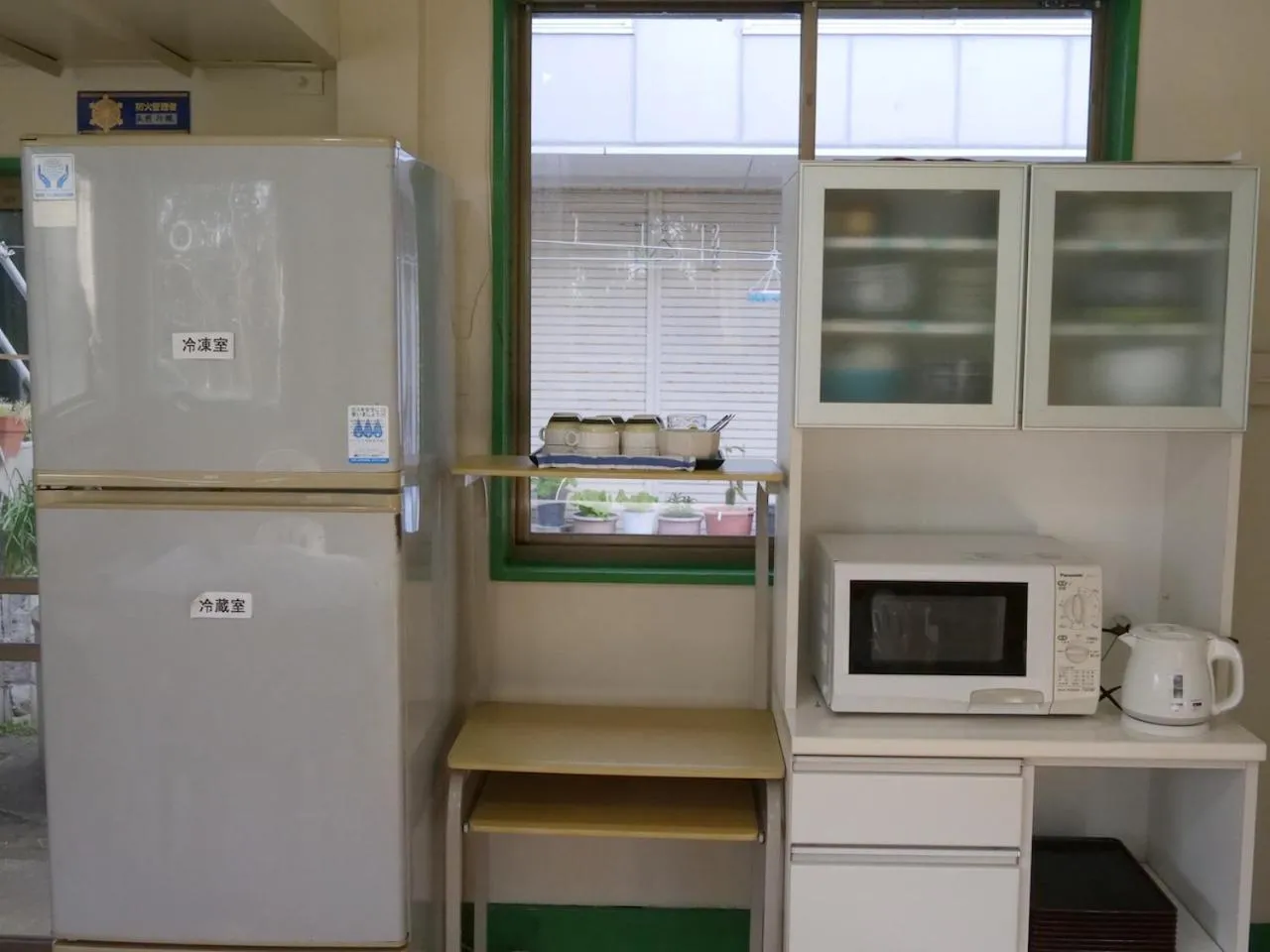 Kitchen or kitchenette in Kobe Guesthouse