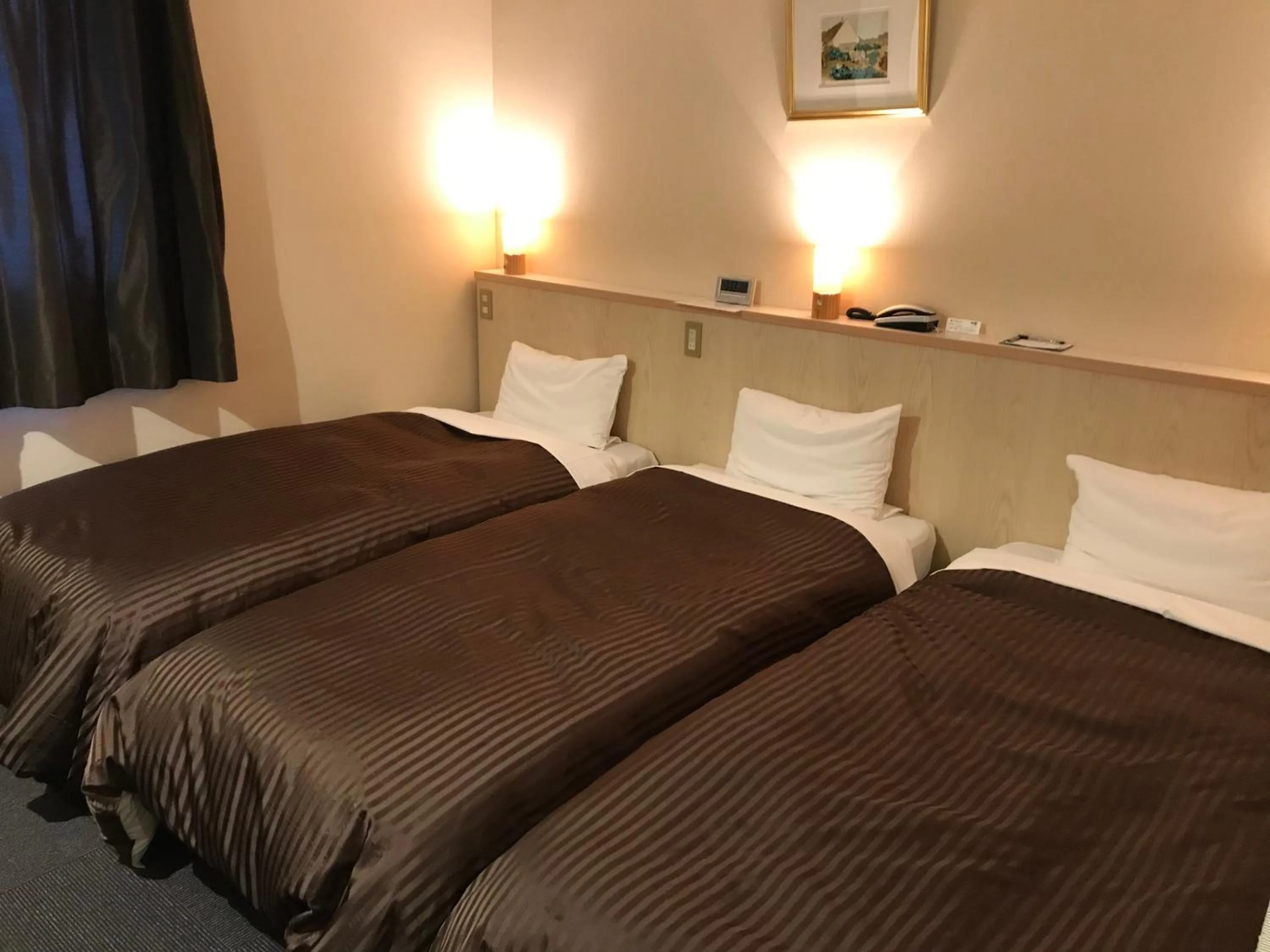 Bed in Hotel Avan Sukumo