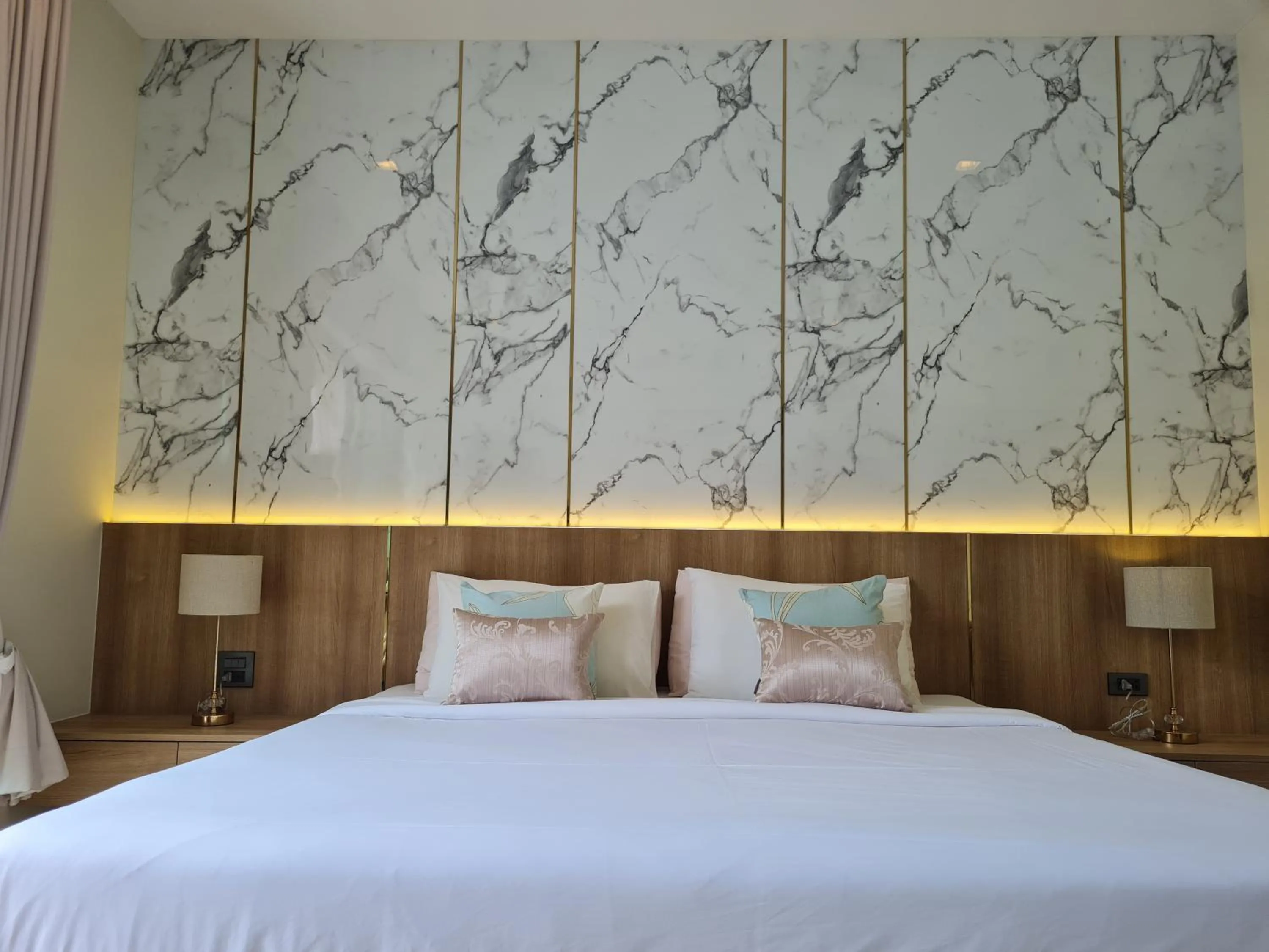 Bed in La Ville Phuket Pool Villa