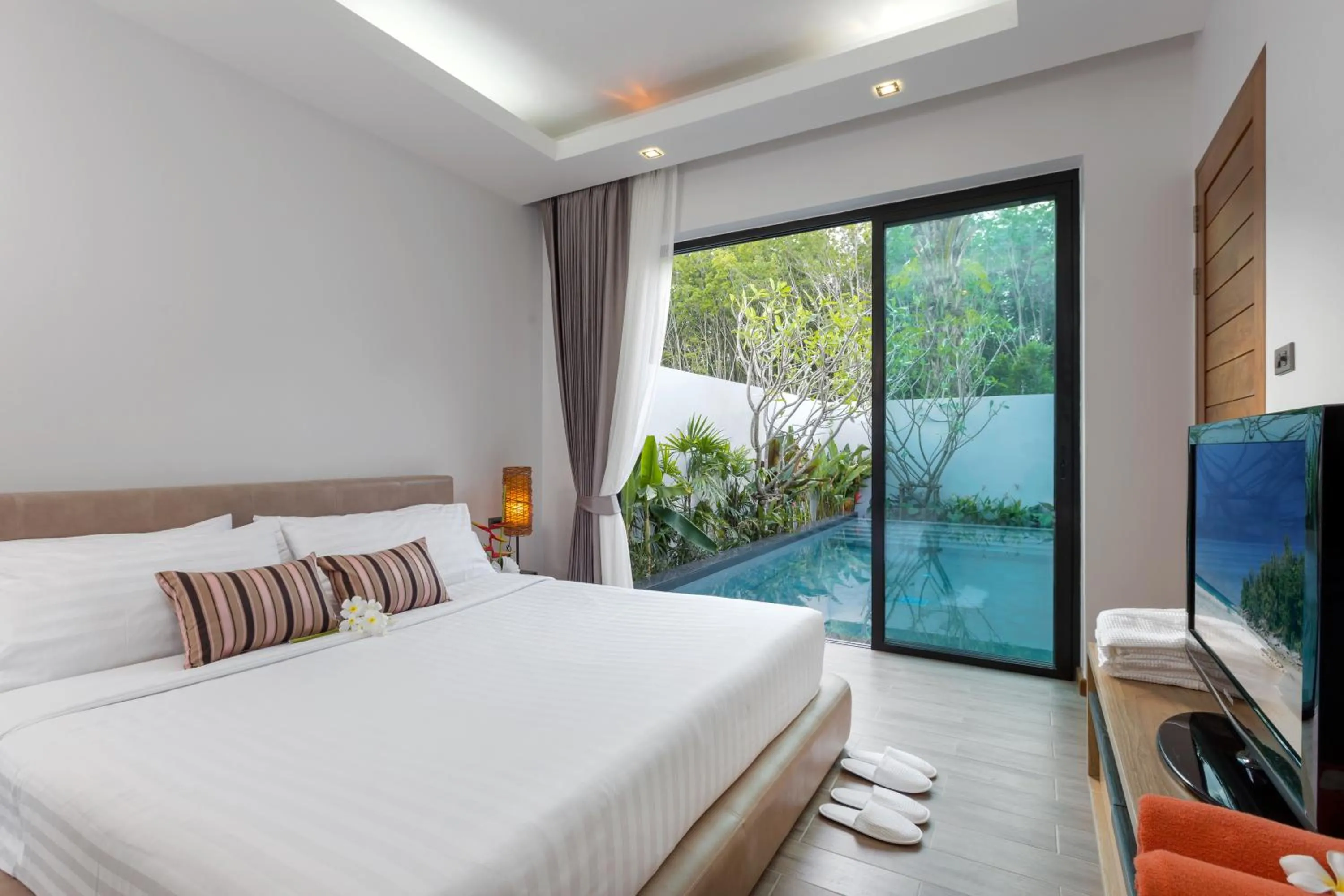Photo of the whole room, Bed in La Ville Phuket Pool Villa