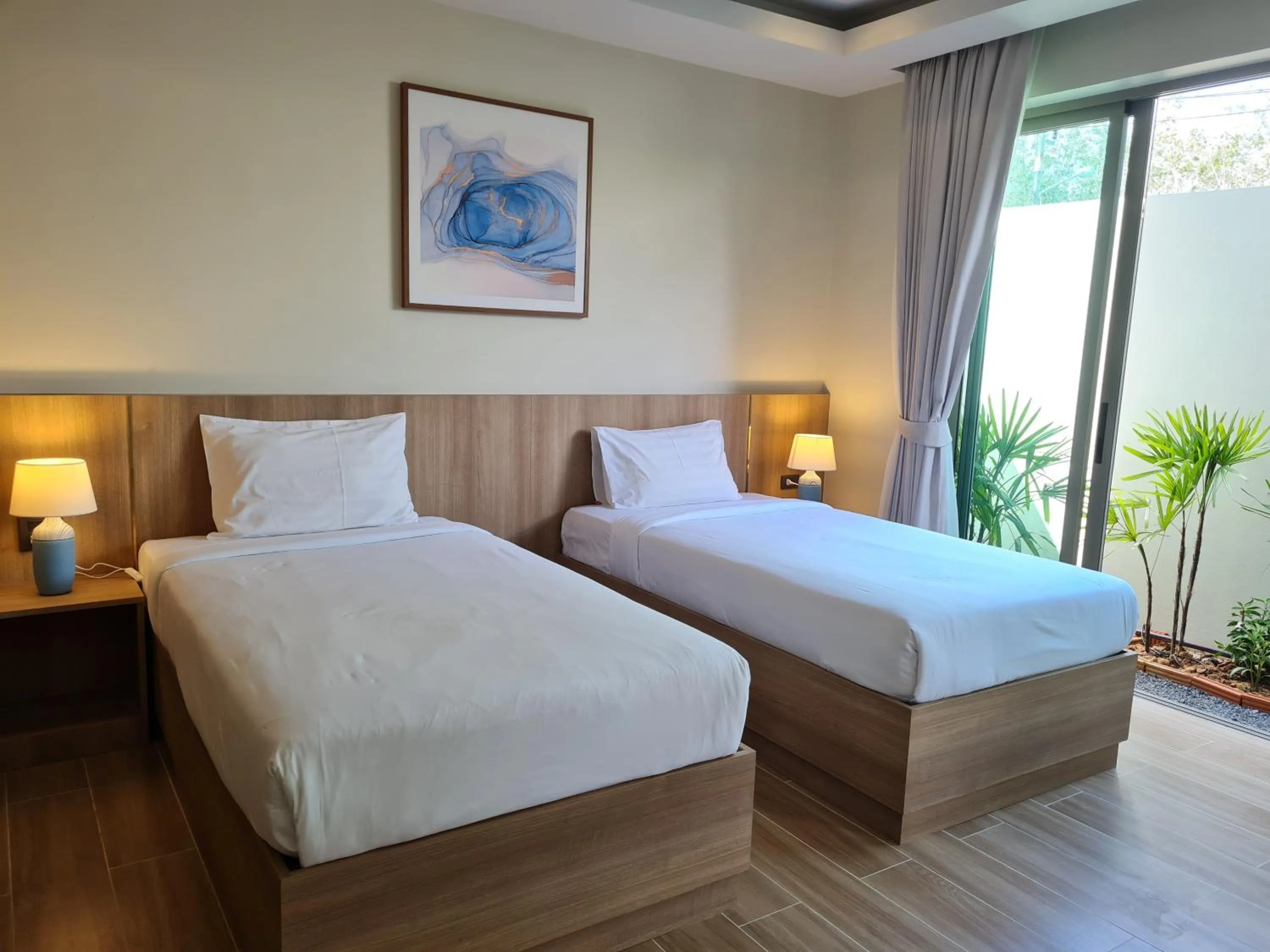 Bed in La Ville Phuket Pool Villa