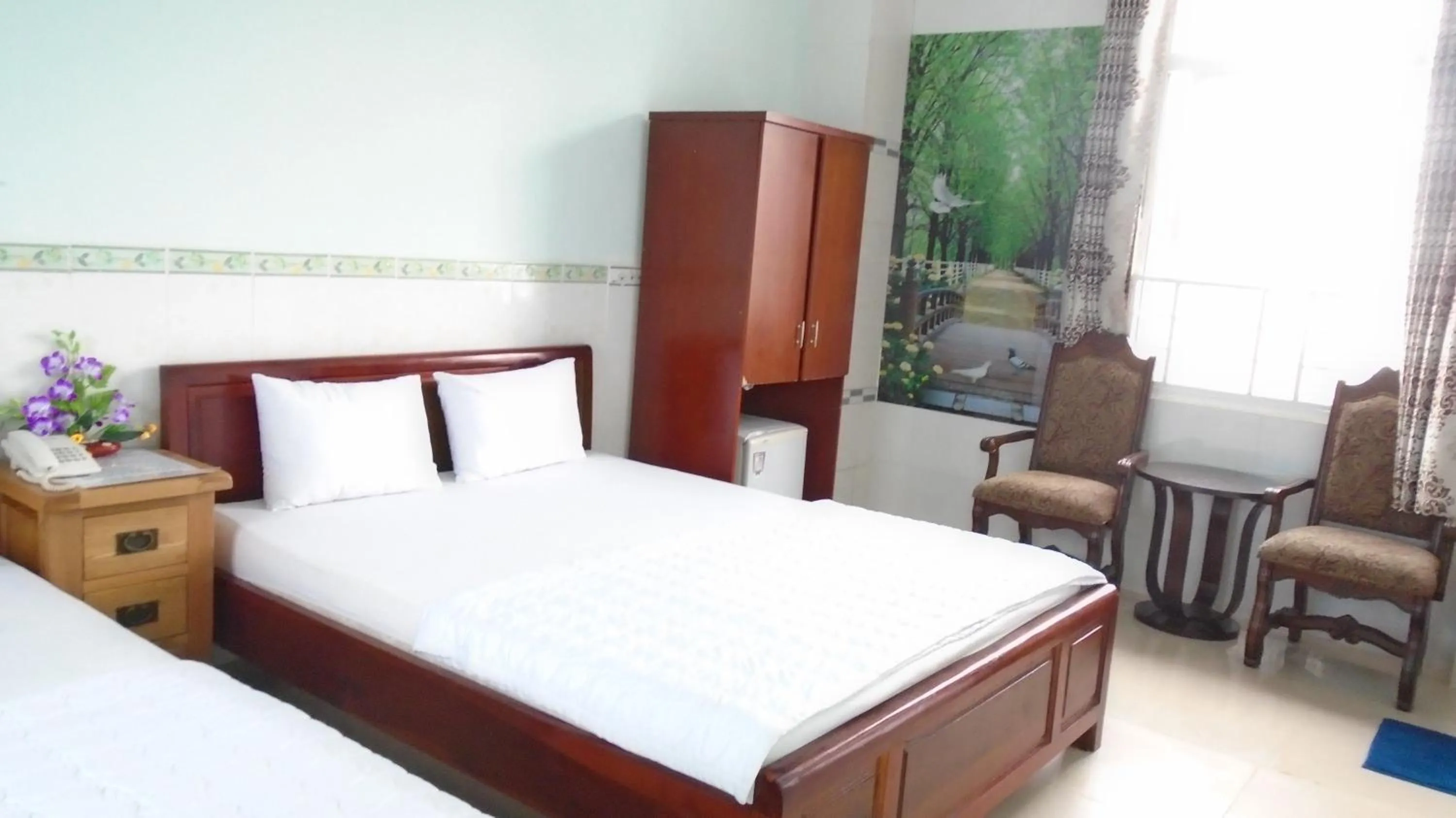 Bed in Hoang Linh Hotel
