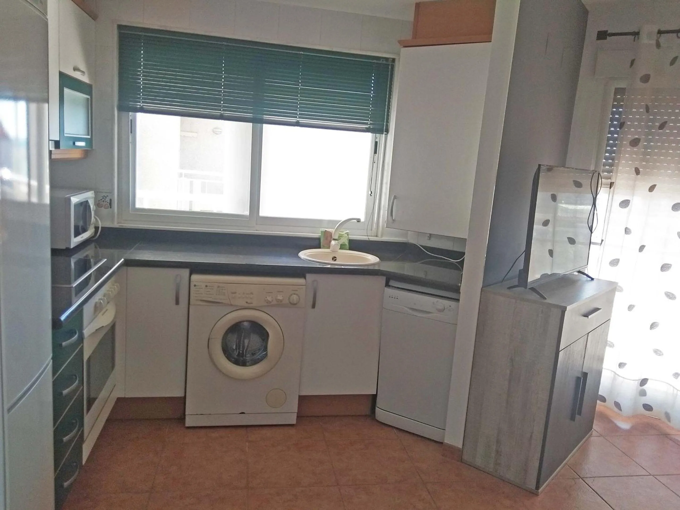 Kitchen or kitchenette in Apartamentos Argenta Caleta 3000