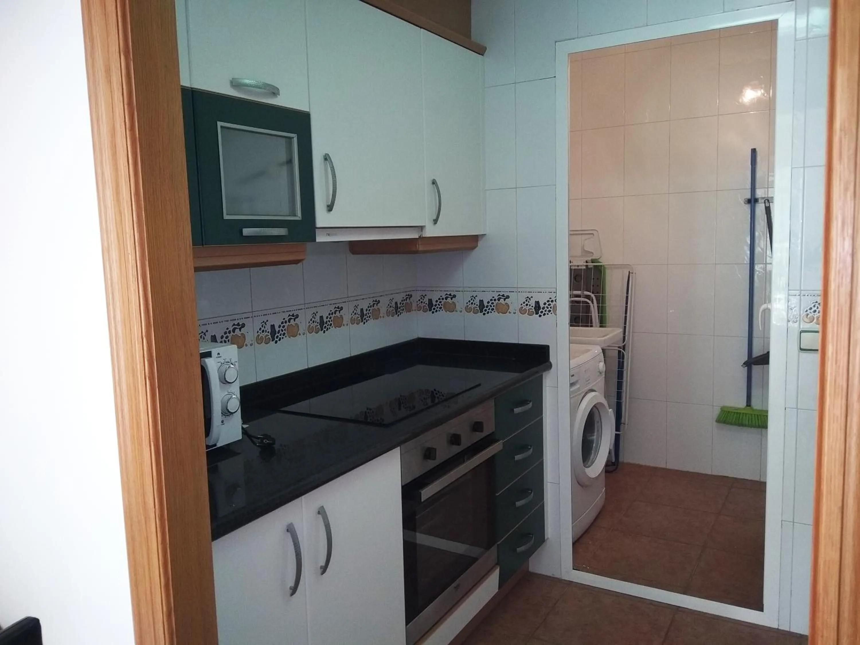 Kitchen or kitchenette in Apartamentos Argenta Caleta 3000