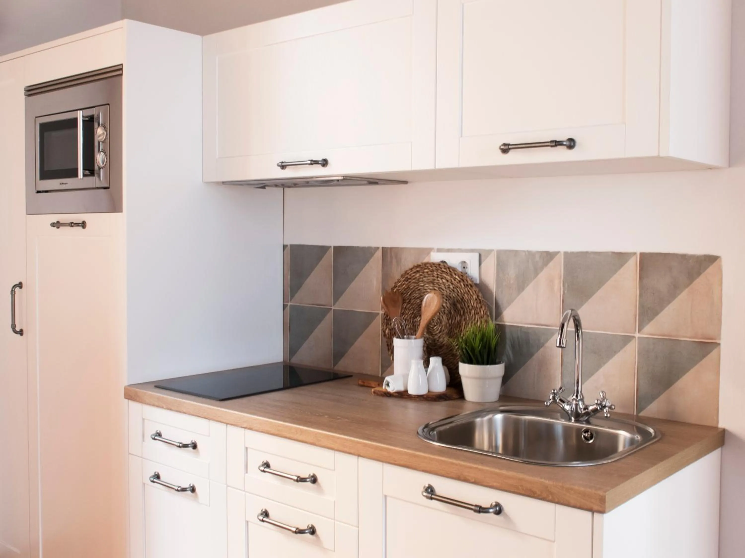 Kitchen or kitchenette in Apartamentos Casa del Aceite