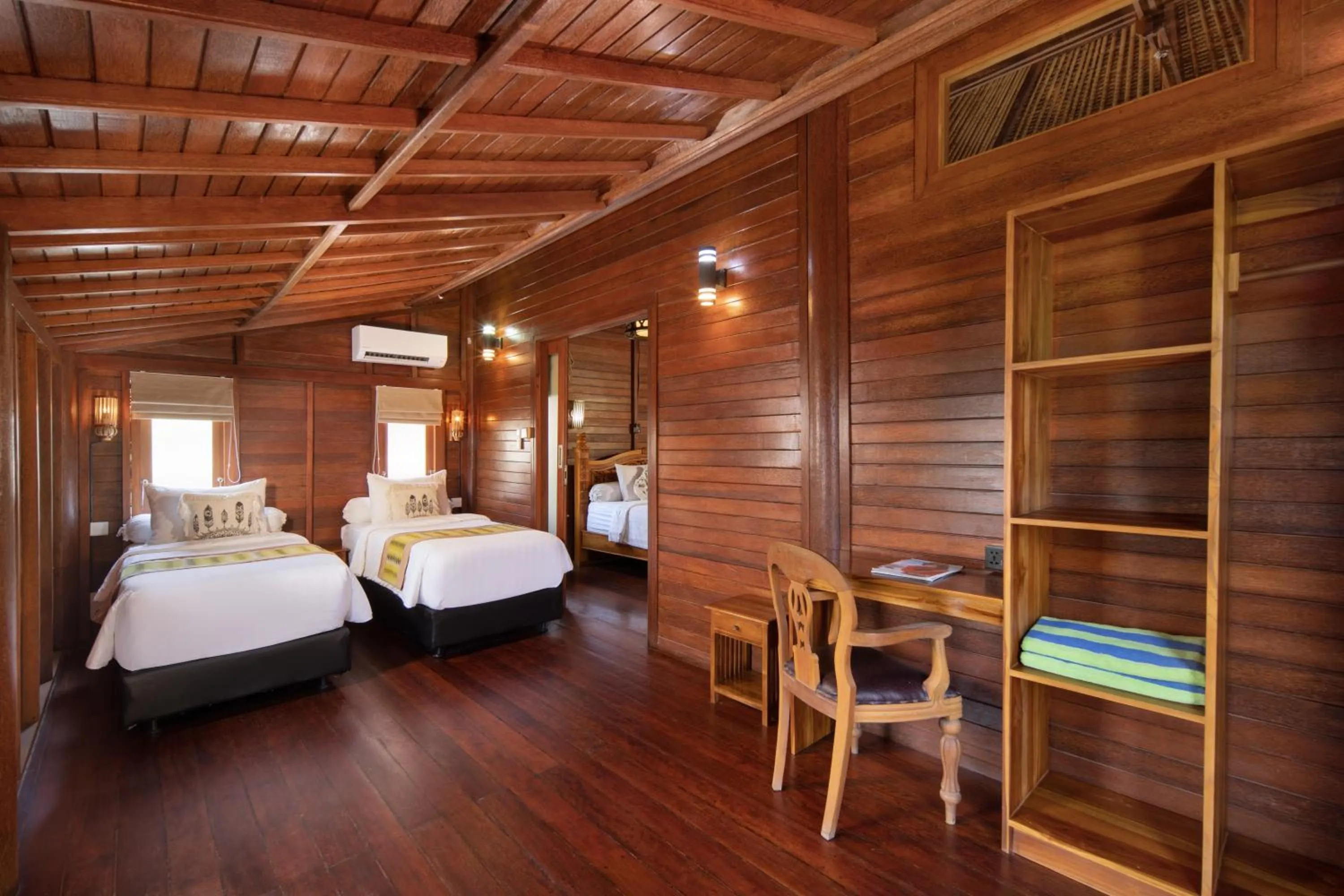 Bed in Gecko Villa & Bungalows