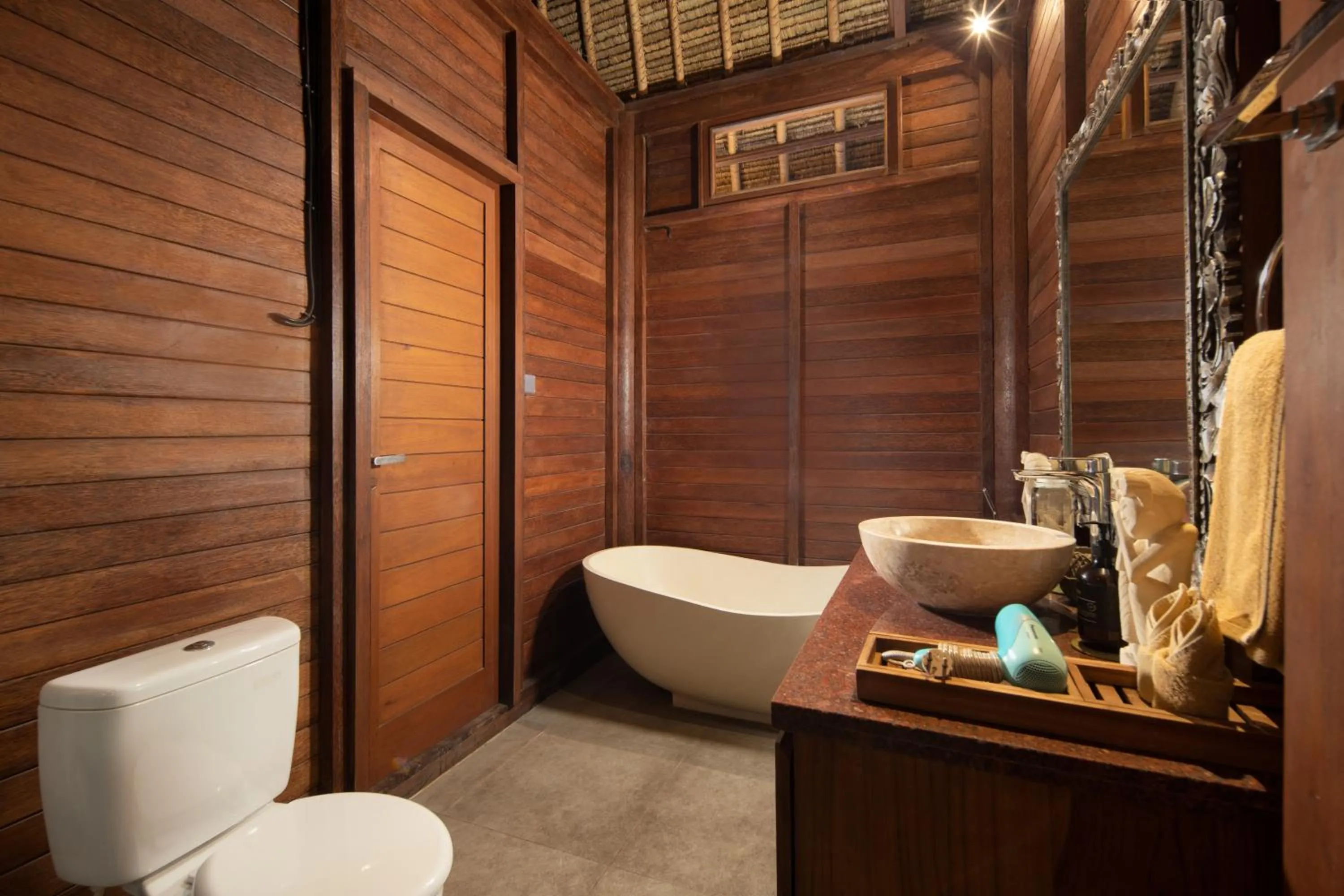 Toilet in Gecko Villa & Bungalows