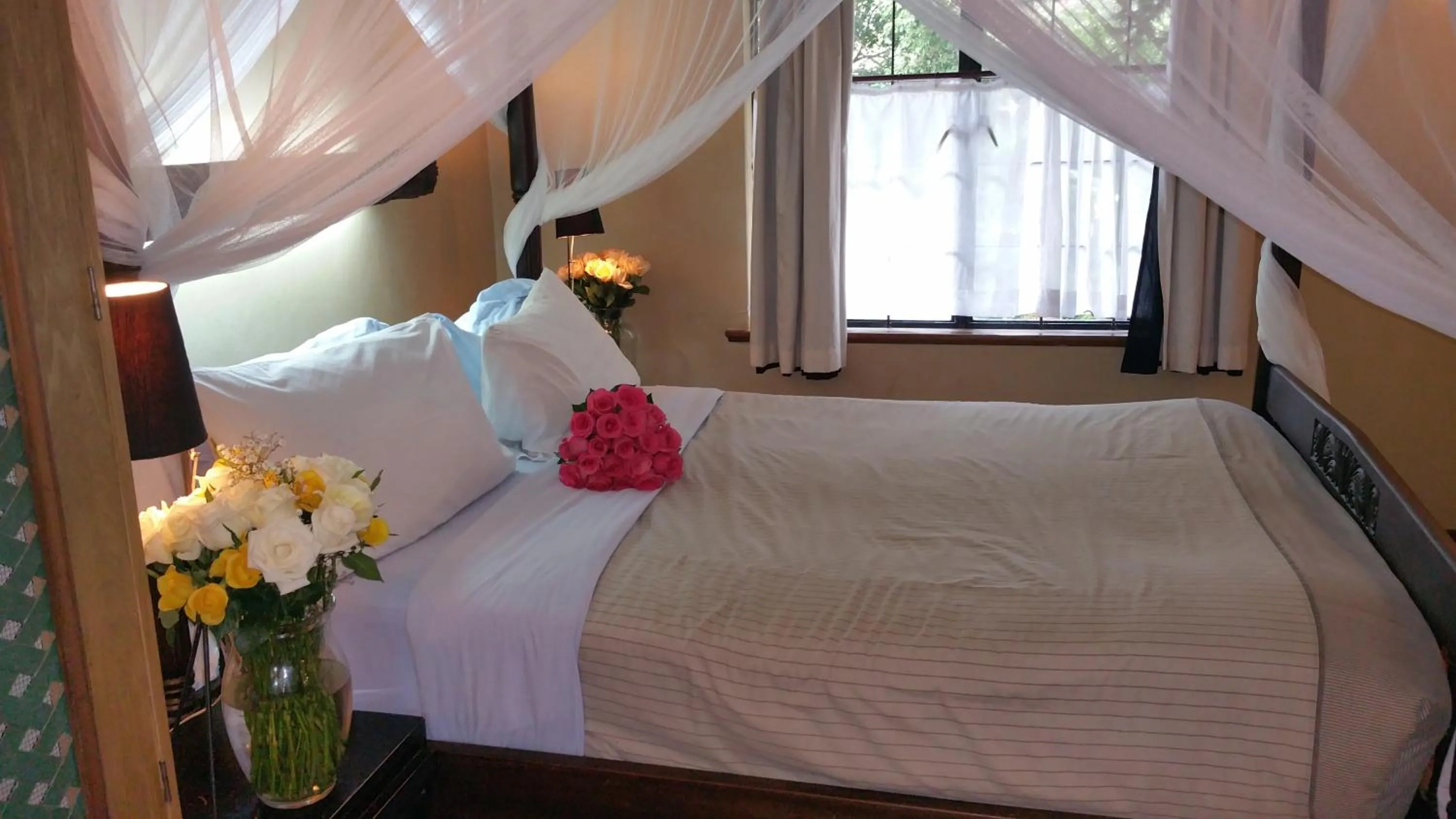 Bed in Woodmere Grand Hotel & Serviced Apartments