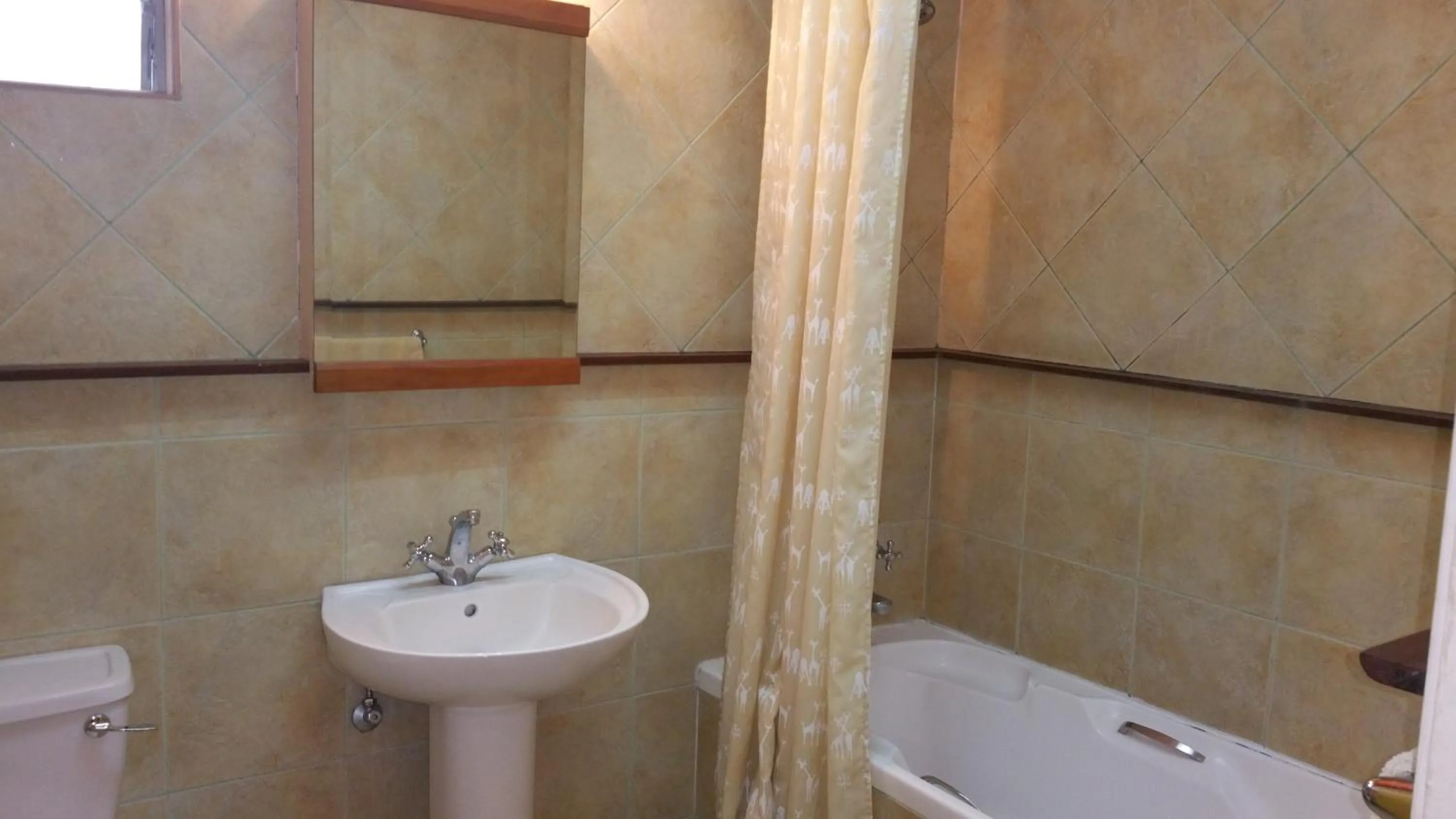 Bathroom in Woodmere Grand Hotel & Serviced Apartments