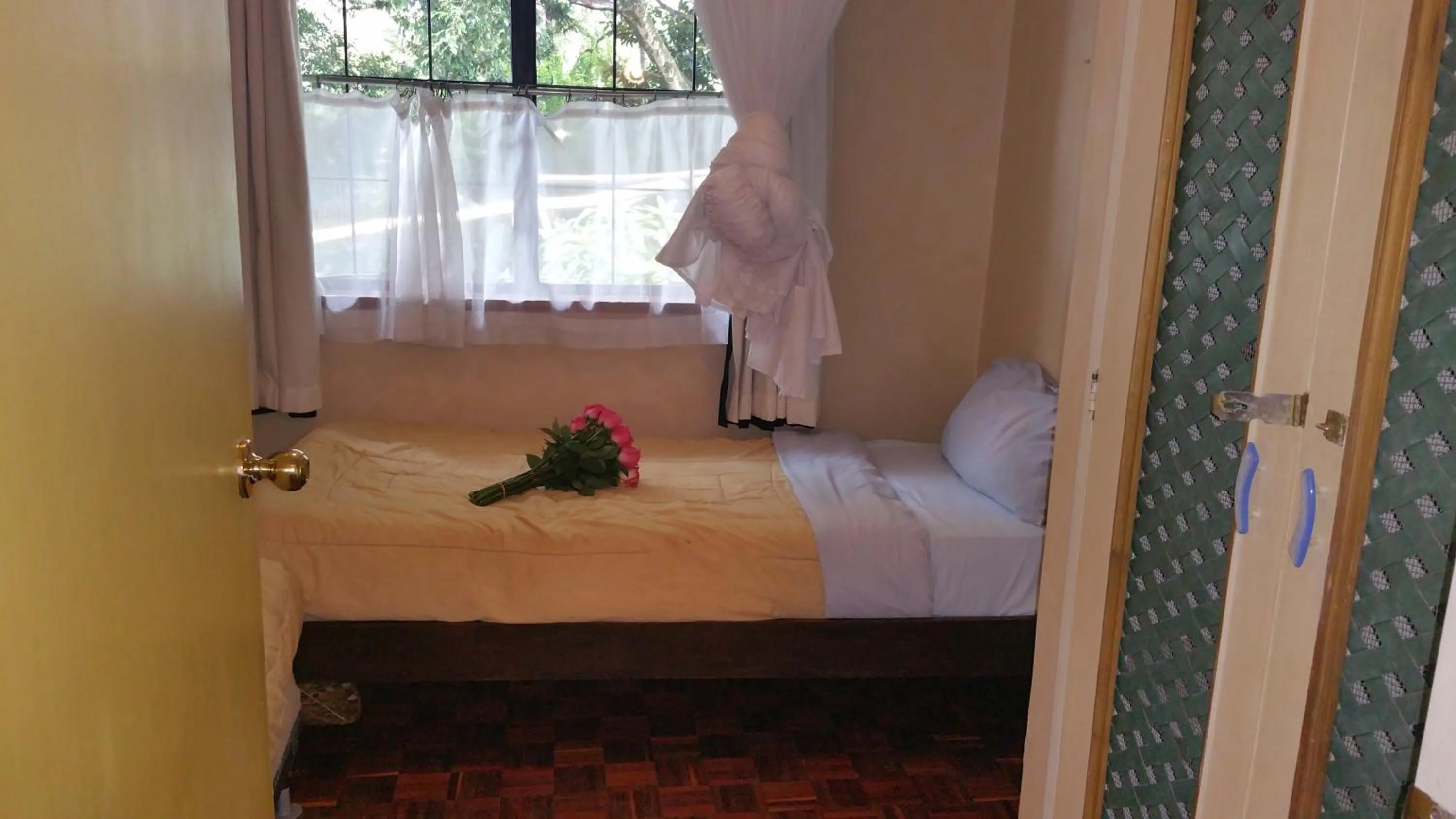 Bed in Woodmere Grand Hotel & Serviced Apartments