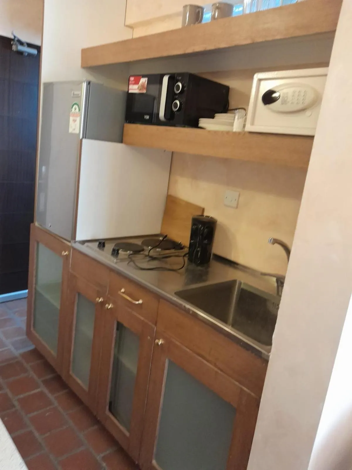 Kitchen or kitchenette in Woodmere Grand Hotel & Serviced Apartments